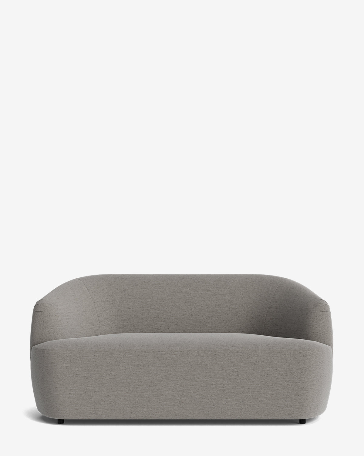 The Byron Settee 68 by Makerspalm is a modern, minimalist grey settee featuring a curved back, smooth rounded edges, and a low backrest, shown against a plain white background. Vendixs