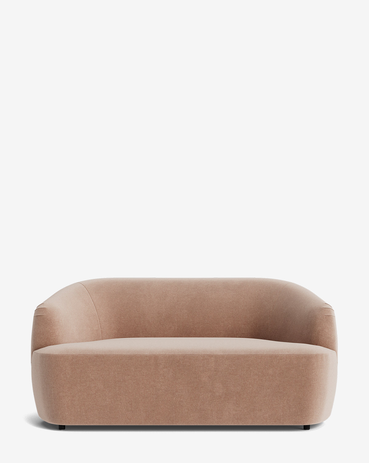 The Makerspalm Byron Settee 68 is a modern, light brown sofa with smooth curves, a low backrest, hidden legs, and custom fabric upholstery, shown against a plain white background by Vendixs