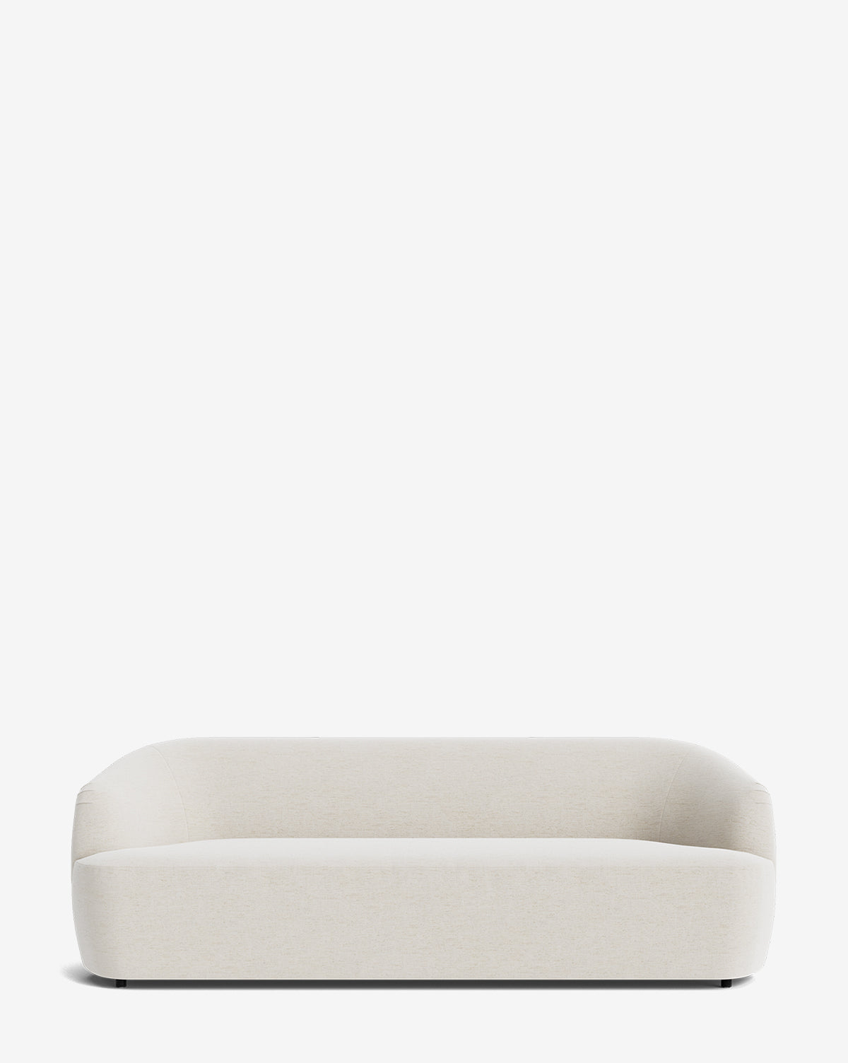 The Makerspalm Byron Sofa 96 is a modern, minimalist cream sofa with a curved back, rounded edges, and low profile, shown against a plain white background. Vendixs