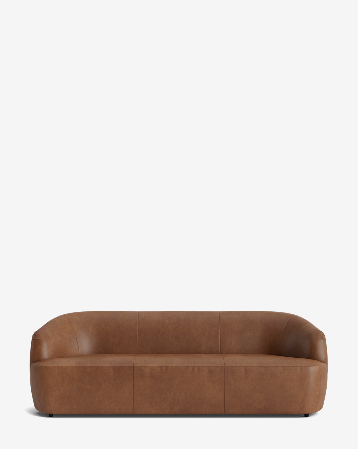The Byron Sofa 96 in brown leather showcases a modern, low-profile design with a curved back and rounded edges, set against a plain white background, by Vendixs