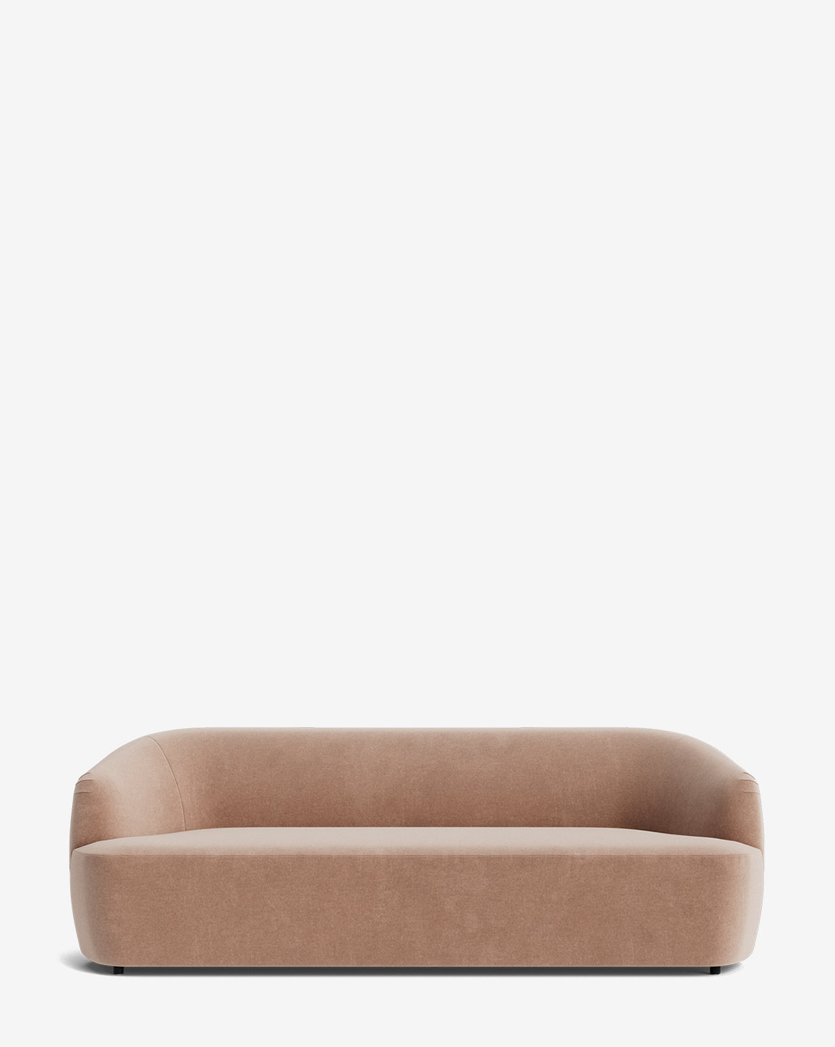 The Makerspalm Byron Sofa 96 features a modern, low-profile curved back, rounded edges, and smooth light brown fabric upholstery, shown against a plain white background. Vendixs