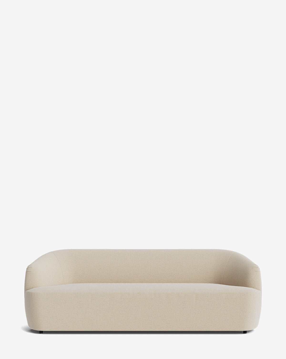 The Makerspalm Byron Sofa 96 features a minimalist, modern design in beige with rounded edges, a low profile, and gently curved back, set against a plain white background. Vendixs