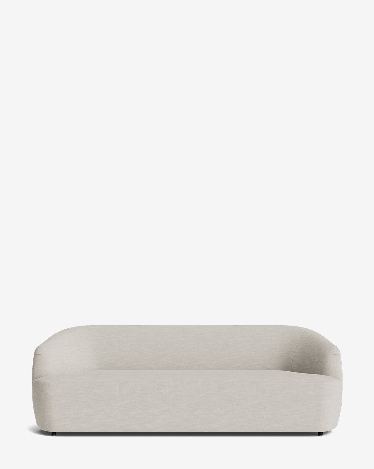 The Byron Sofa 96 in light beige has a modern, minimalist design with rounded edges and a low backrest, displayed on a plain white background, by Vendixs