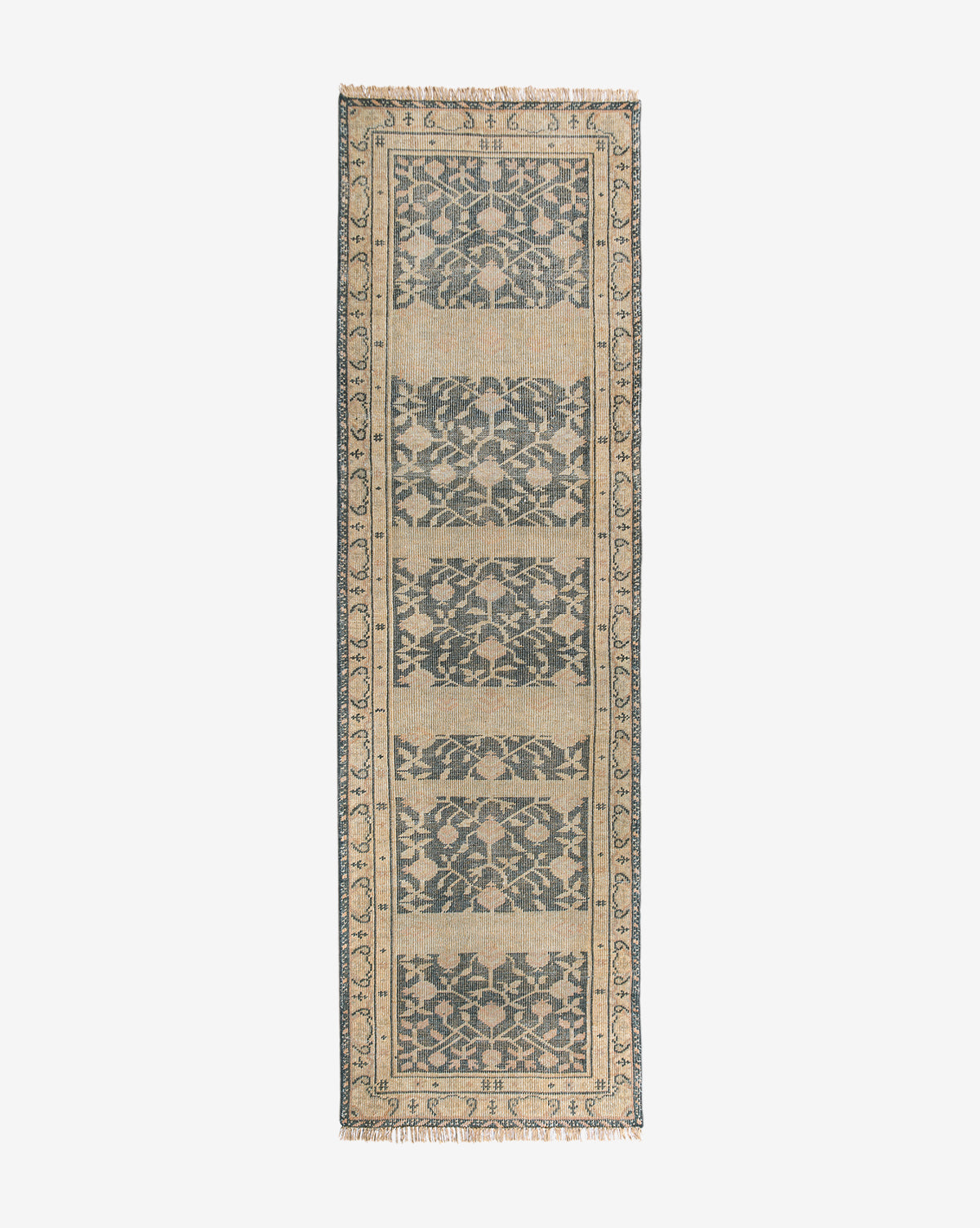 The Campanella Hand-Knotted Wool Rug features a rectangular beige base with a repeating dark blue floral and geometric central pattern, an ornate matching border, and short fringe at each end for artisan authenticity, by Vendixs
