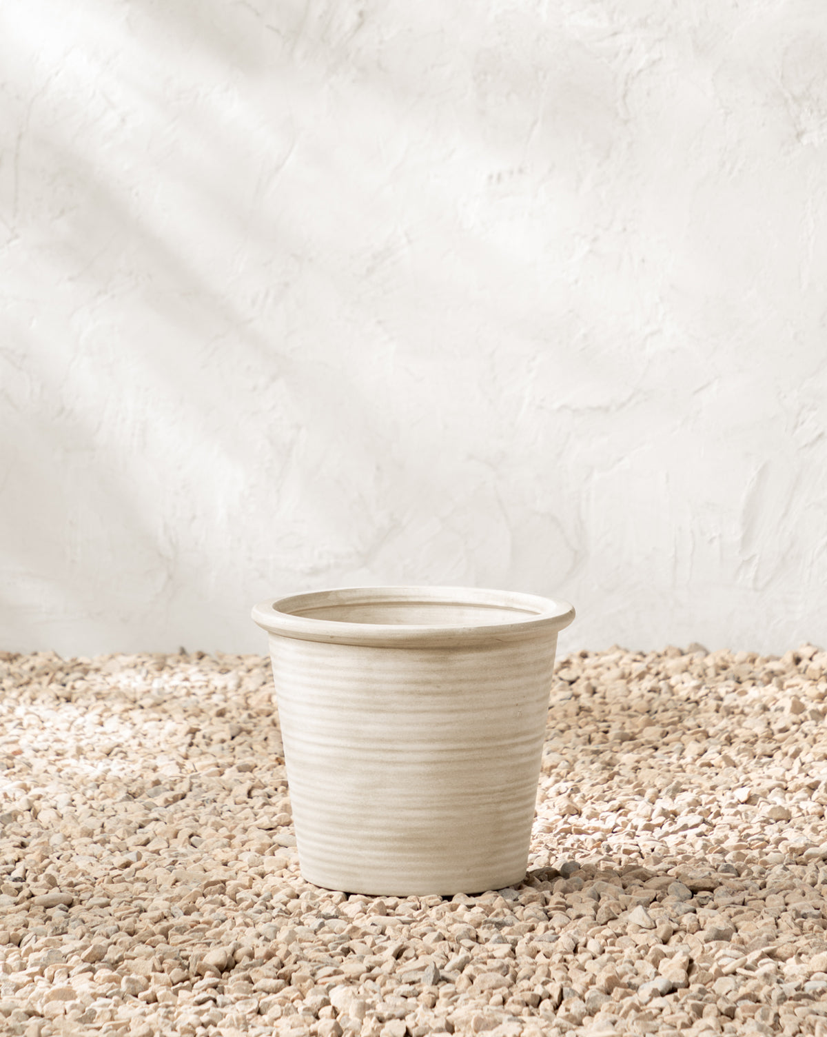 13.5” Dia. x 11.5” H ceramic planter ideal for medium-sized outdoor plants, from Vendixs
