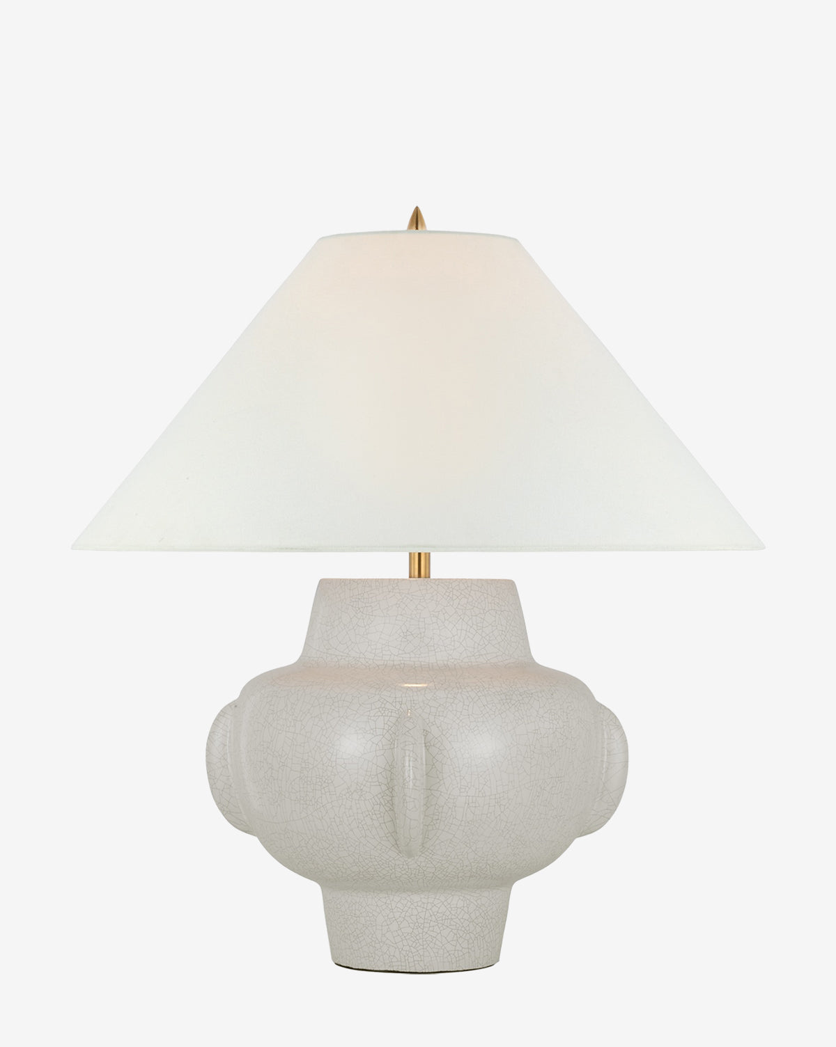 The Cap-Ferrat Table Lamp by Visual Comfort & Co. Signature showcases a wide white linen shade and a light gray, textured round ceramic base with symmetrical raised side details for extra charm. Vendixs