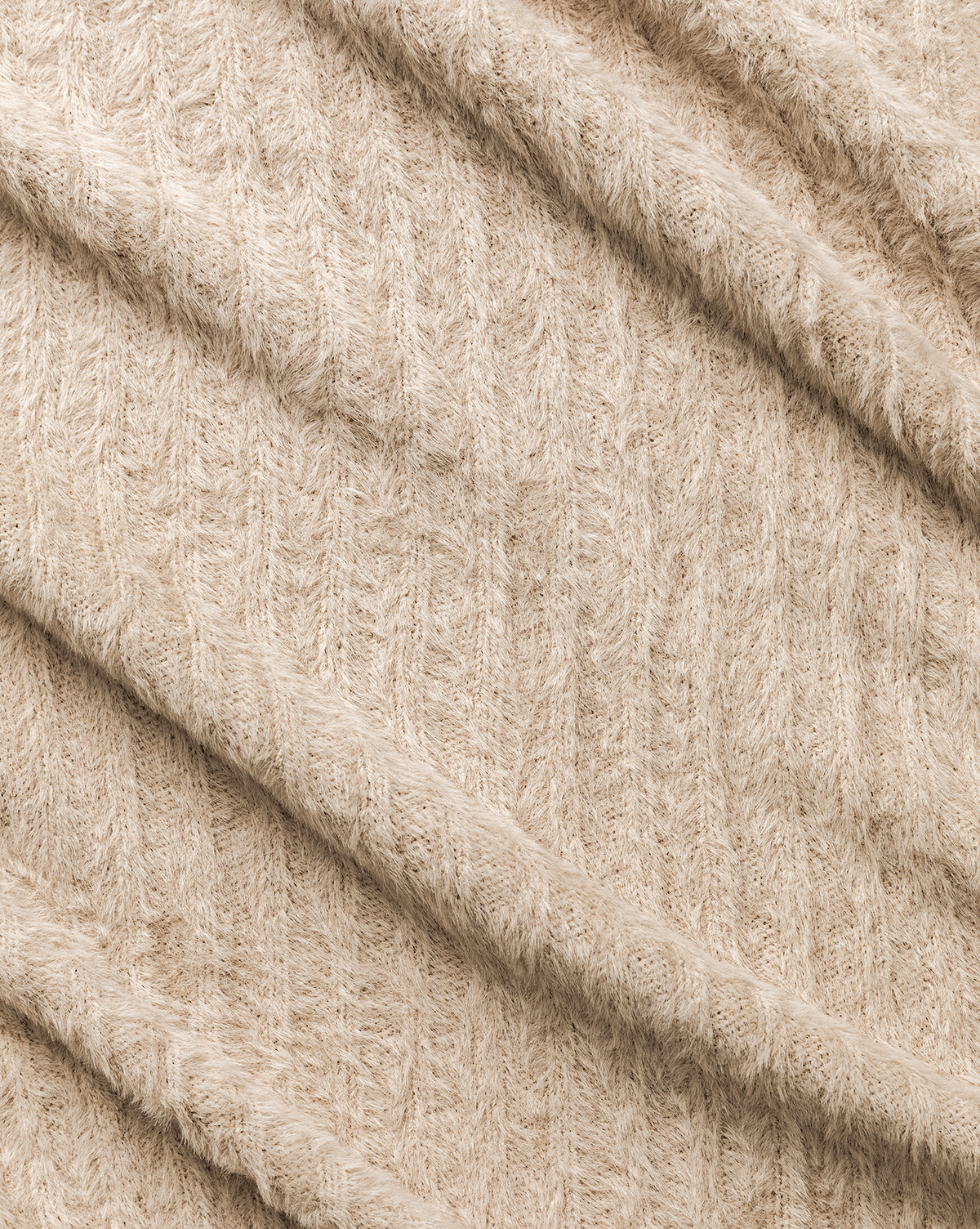 A close-up of the Caro Throw's soft, beige knit fabric with a subtle cable pattern and gentle diagonal folds—perfect as a neutral accent to add cozy decor to any room, by Vendixs