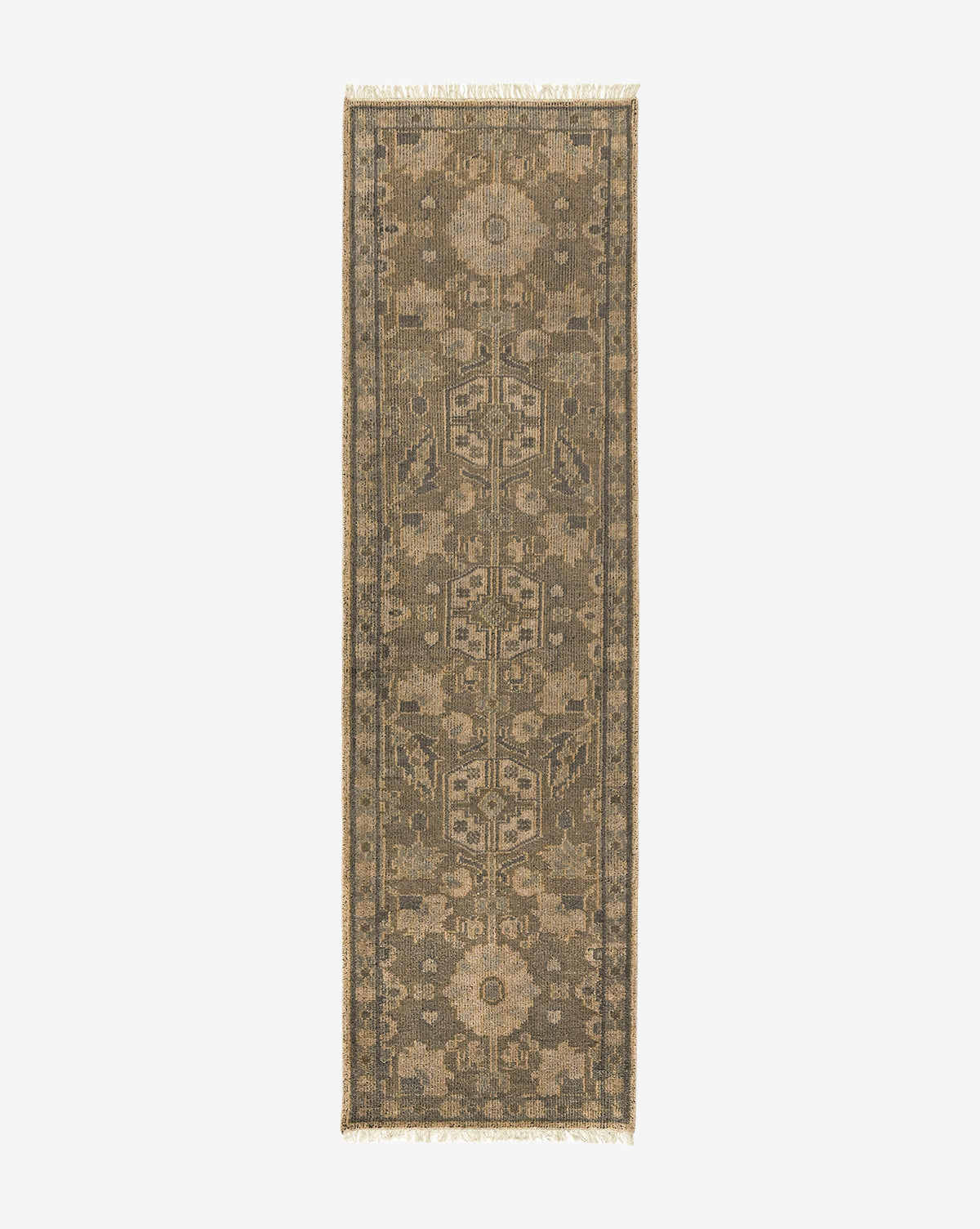 The Chevalier Hand-Knotted Wool Rug is a narrow, rectangular piece with muted earthy-toned geometric and floral motifs, intricate detailing, and fringed edges on both ends, displayed on a light background for timeless elegance by Vendixs