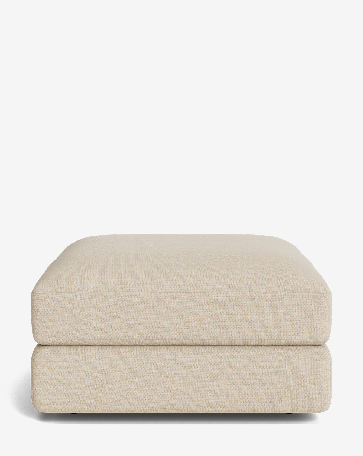 The Makerspalm Claremont Modular Ottoman is a beige, rectangular ottoman with a cushioned top and minimalist design, shown against a plain white background. Vendixs