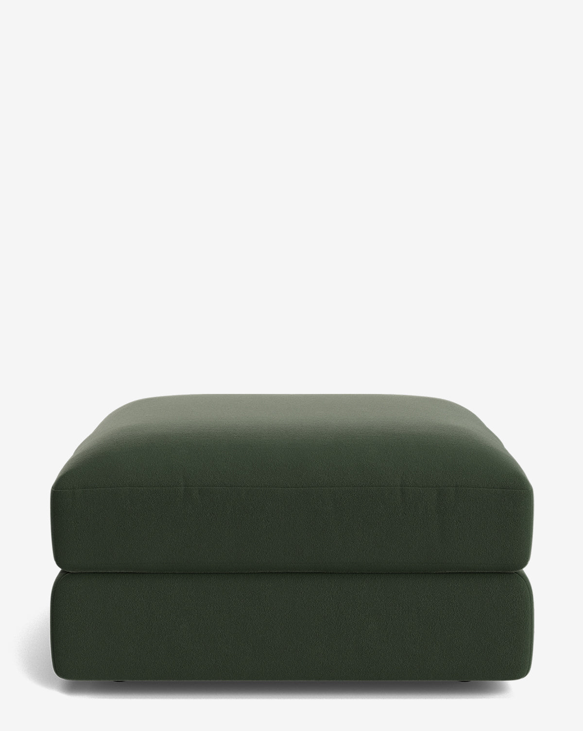 The Makerspalm Claremont Modular Ottoman features a green, rectangular shape with a cushioned top and simple modern design, displayed against a plain white background. Vendixs