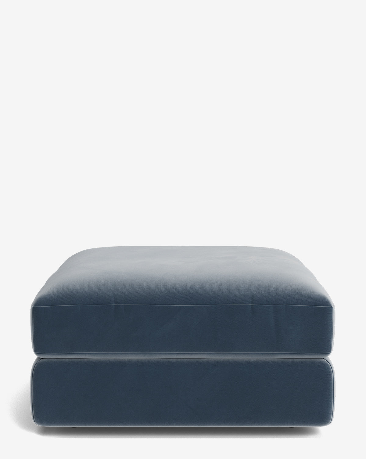 The Makerspalm Claremont Modular Ottoman, featuring a blue rectangular shape and simple modern design, is displayed against a plain white background. Vendixs