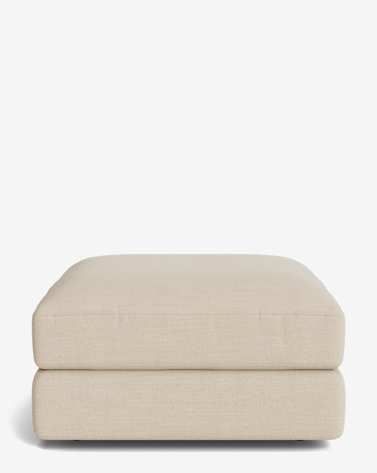 The Makerspalm Claremont Modular Ottoman features a beige, rectangular design with vintage-inspired, rounded edges and a low profile. Its smooth, tightly upholstered fabric stands out against a plain white background. Vendixs