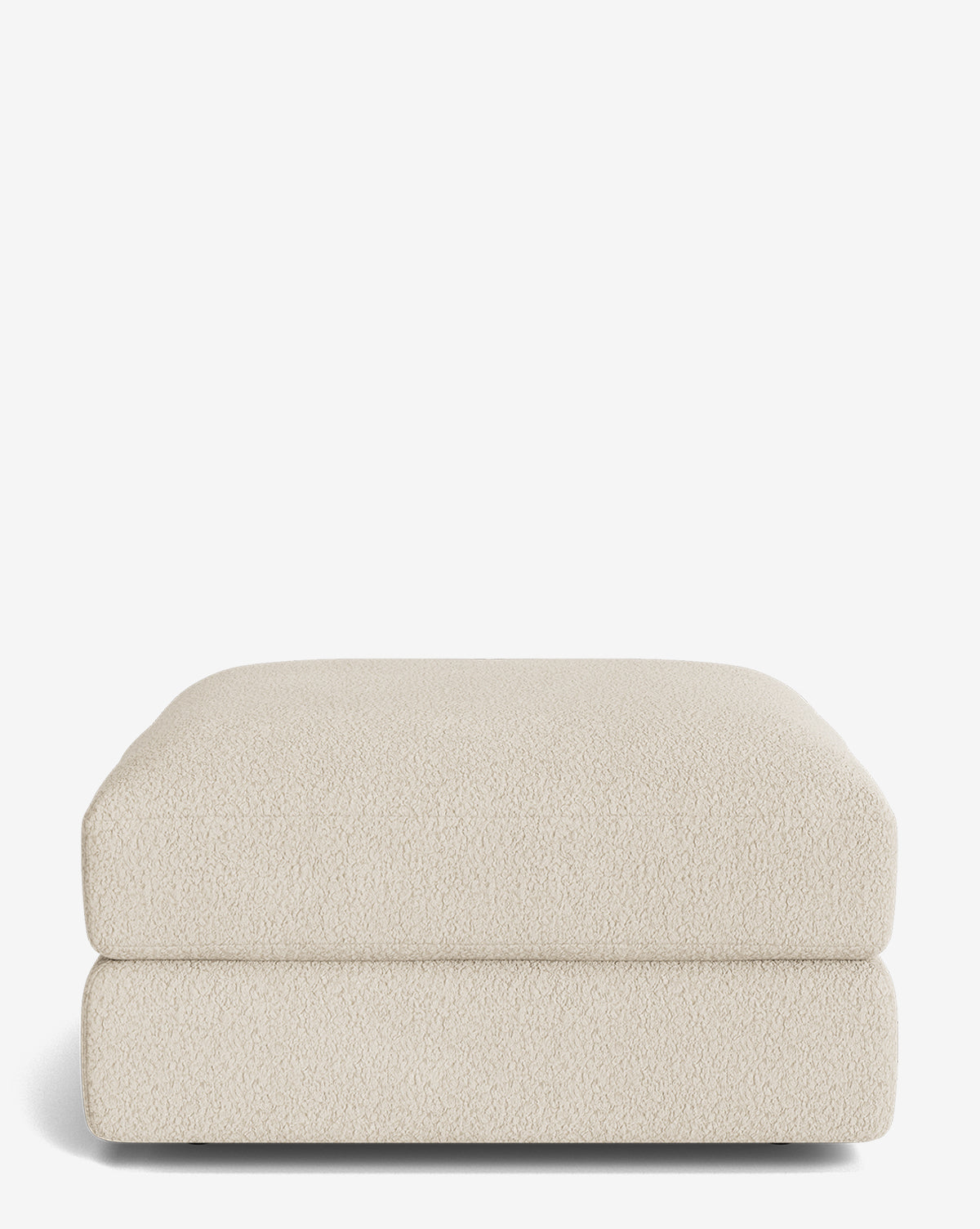 The Makerspalm Claremont Modular Ottoman features a modern rectangular shape, beige textured upholstery, rounded edges, and minimalist design, shown against a plain white background. Vendixs
