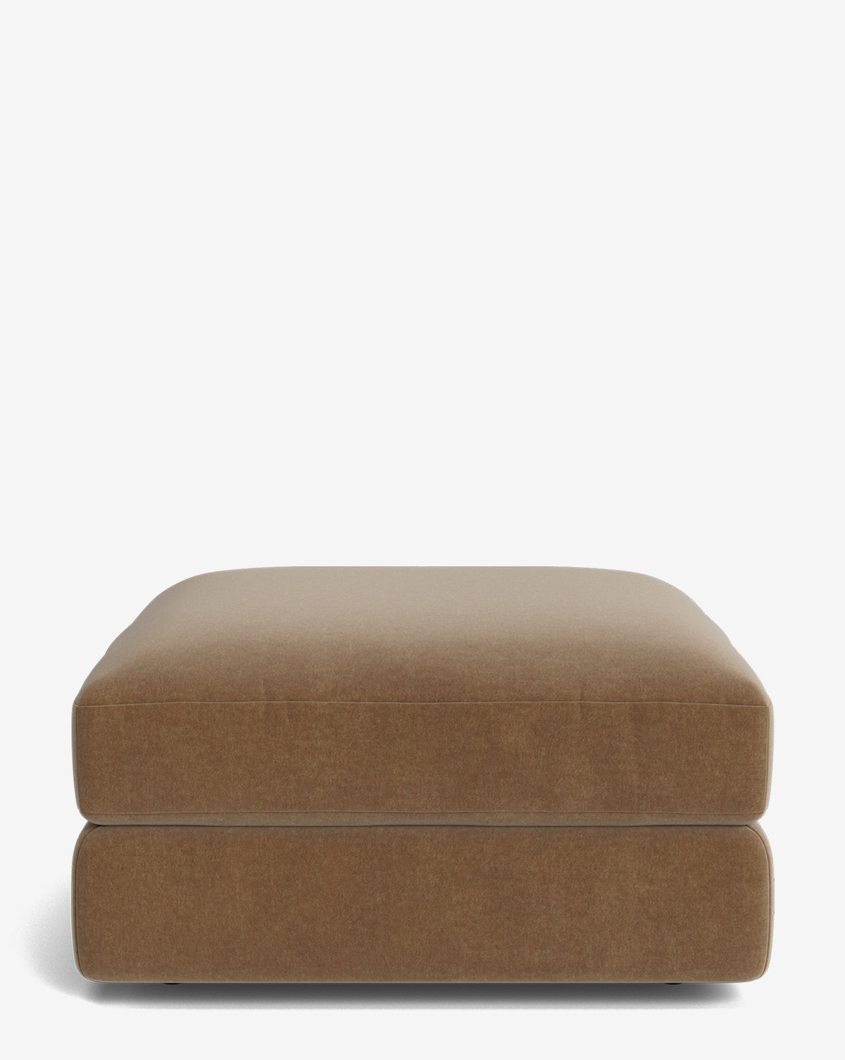 The Claremont Modular Ottoman by Makerspalm features a large, rectangular light brown design with a plush cushion and modern style, shown against a plain white background, blending seamlessly with the aesthetic of Vendixs.