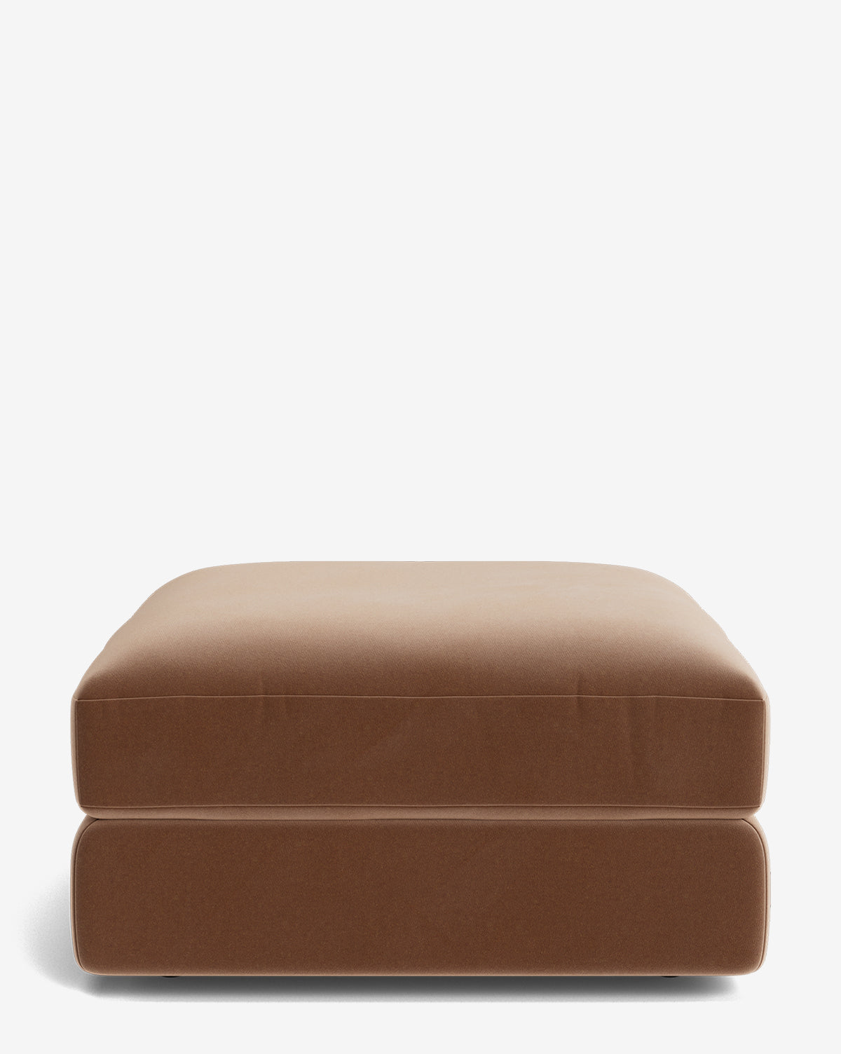 The Makerspalm Claremont Modular Ottoman features a square shape, brown upholstery, clean lines, and a smooth, soft surface, shown against a plain white background. Vendixs
