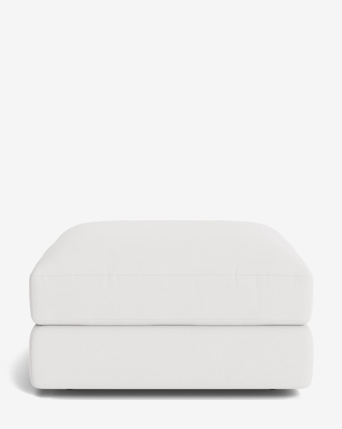 The Makerspalm Claremont Modular Ottoman is a rectangular, low-profile piece with a cushioned top and modern design, displayed against a plain white background. Vendixs