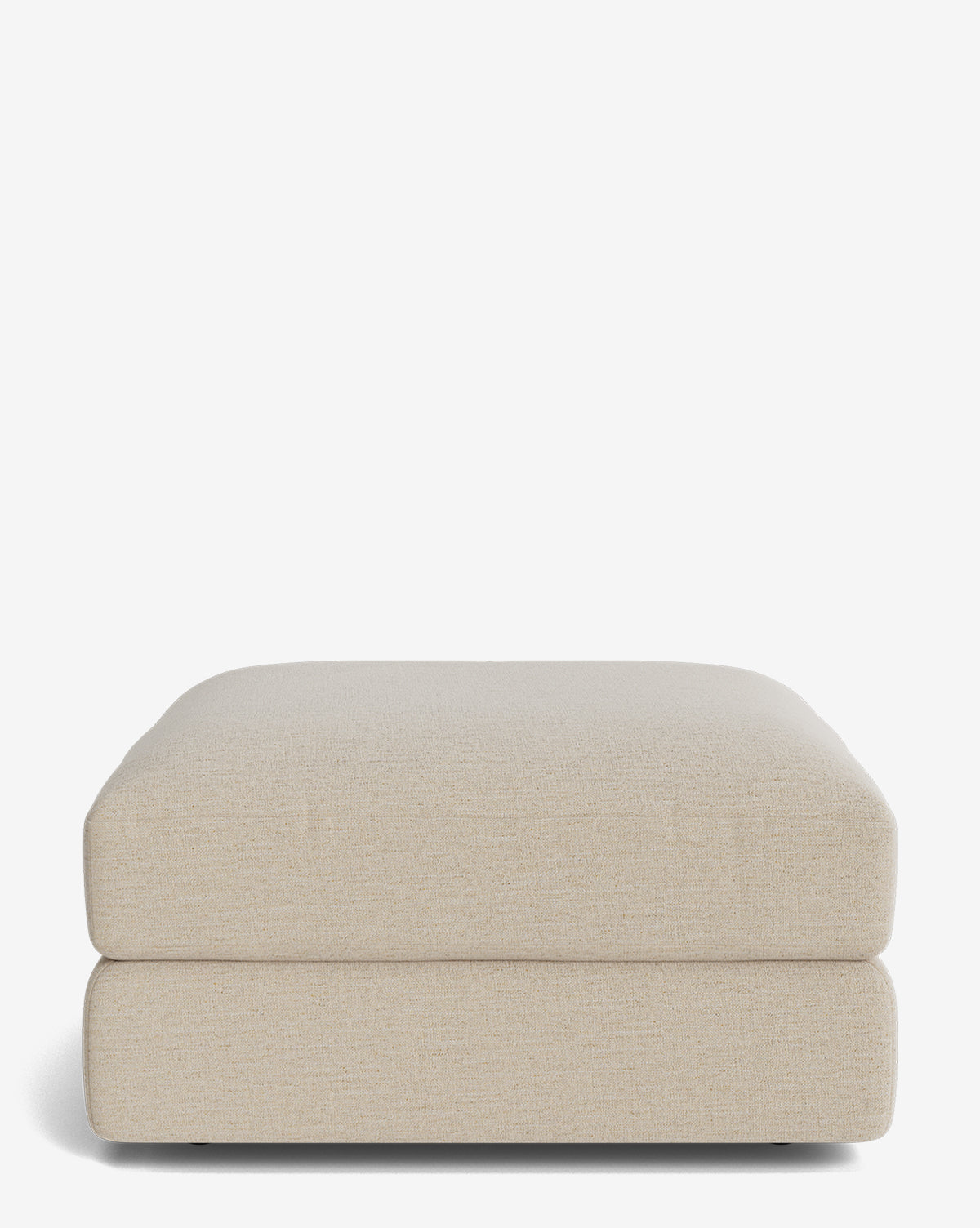 The Makerspalm Claremont Modular Ottoman features a beige, rectangular design with a soft cushioned top and minimalist style, shown against a plain white background. Vendixs