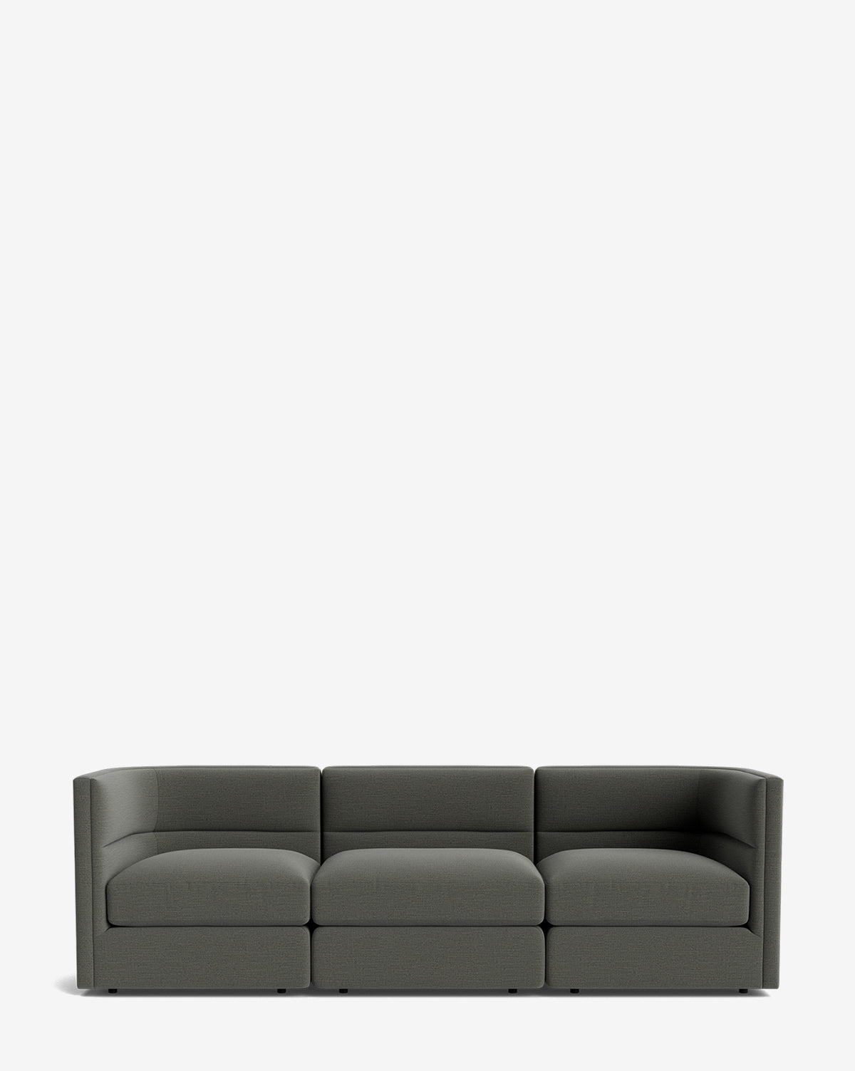 The Makerspalm Claremont Modular Sofa 99 is a modern, dark gray three-seater with low, boxy arms and backrest, shown against a plain white background. Vendixs
