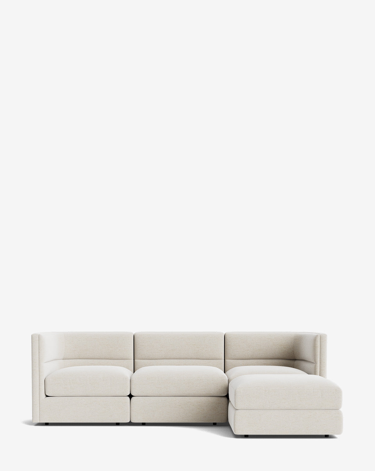 The Makerspalm Claremont Modular Sofa with Ottoman 99 features three seats, a right-facing chaise, and light beige plain fabric upholstery, shown against a white background. Vendixs