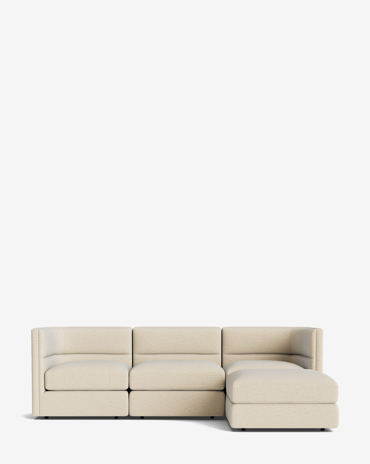 The Makerspalm Claremont Modular Sofa with Ottoman 99 features a modern, low-profile beige design with three seats and a right-side chaise, shown against a plain white background, by Vendixs