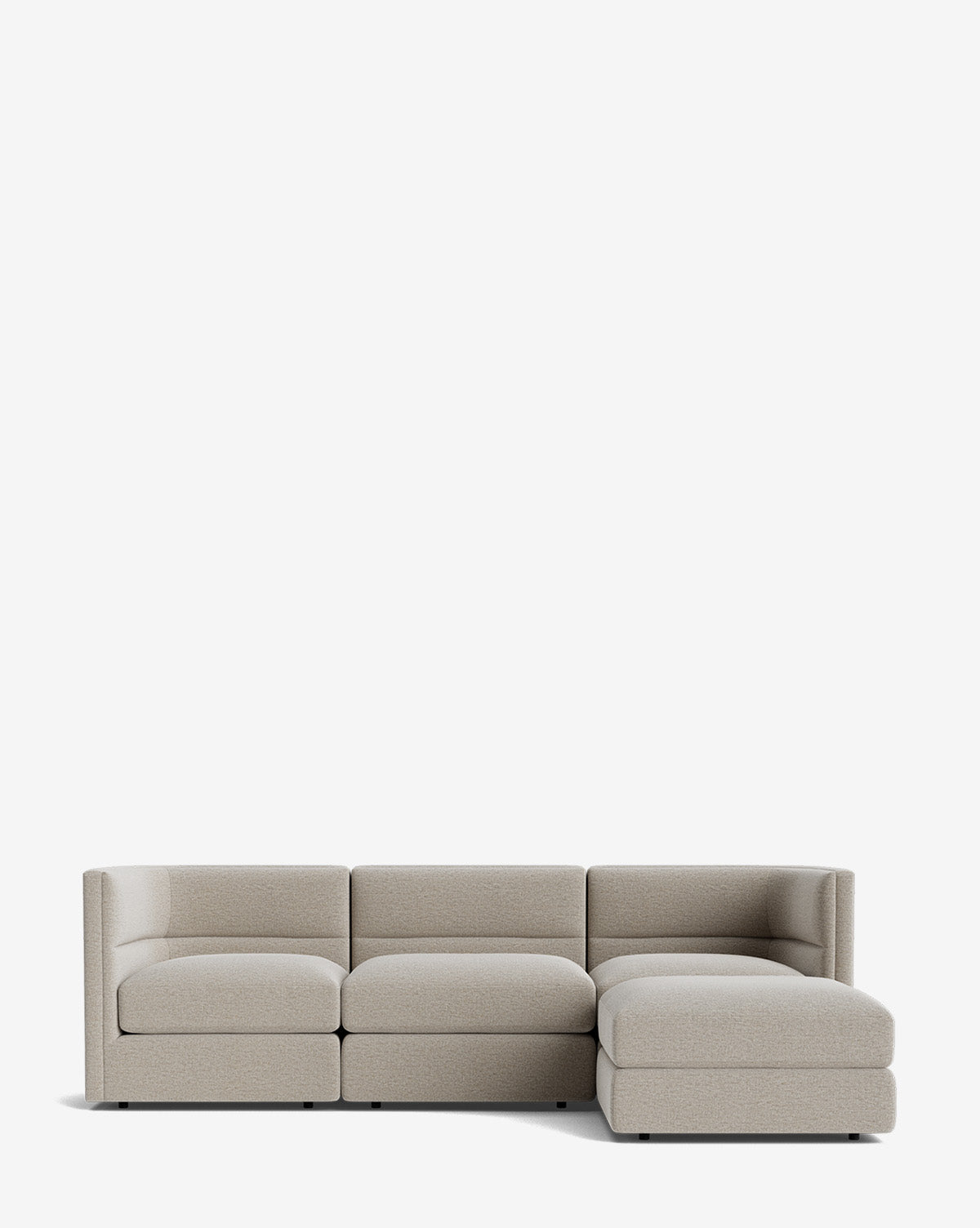 The Makerspalm Claremont Modular Sofa with Ottoman 99 is a modern, light gray three-seater with a right-side chaise lounge, shown against a plain white background. Vendixs