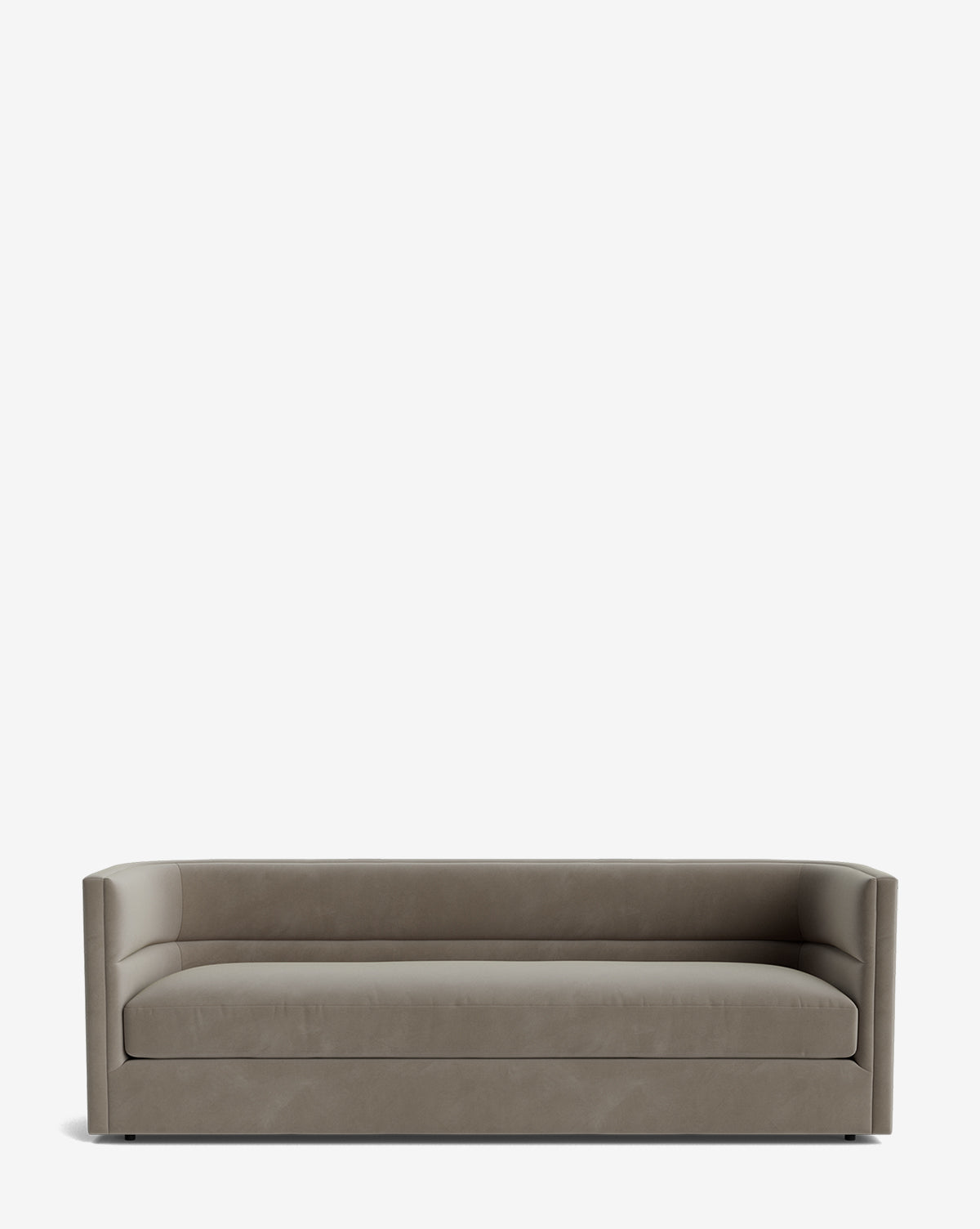 The Claremont Sofa 84 features high-quality fabric upholstery, straight lines, a low backrest, and raised armrests for a modern, minimalist look. Its sleek silhouette sits directly on the floor with no visible legs, by Vendixs