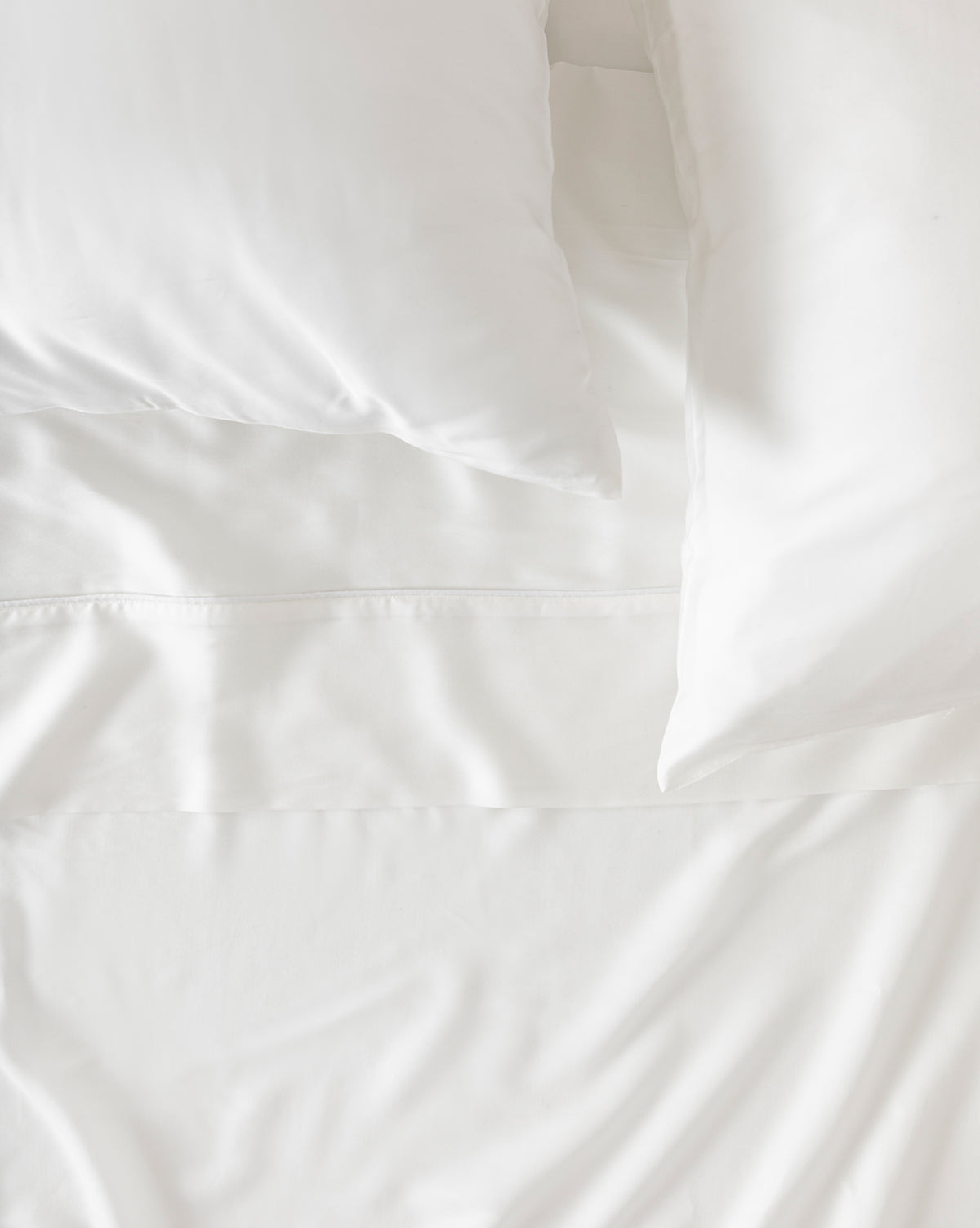 Close-up of 100% Tencel sateen weave highlighting soft sheen and detail from Vendixs