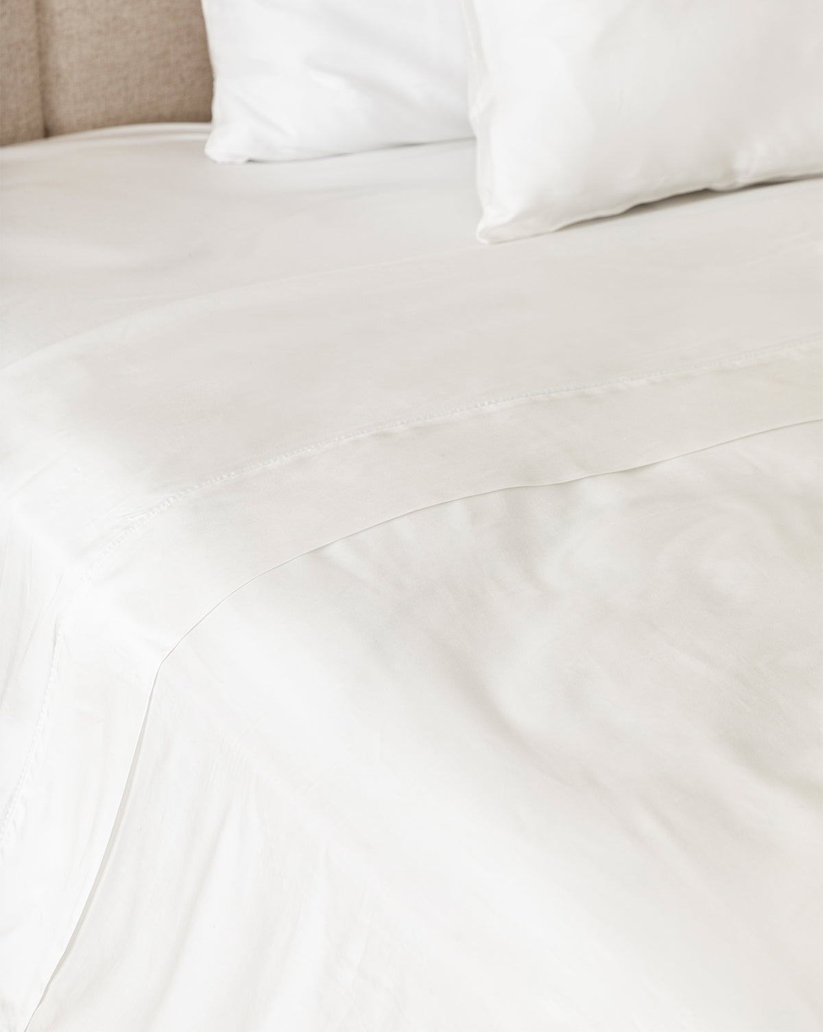 Claussen Tencel Sheet Set styled with neutral bedding for a serene look from Vendixs