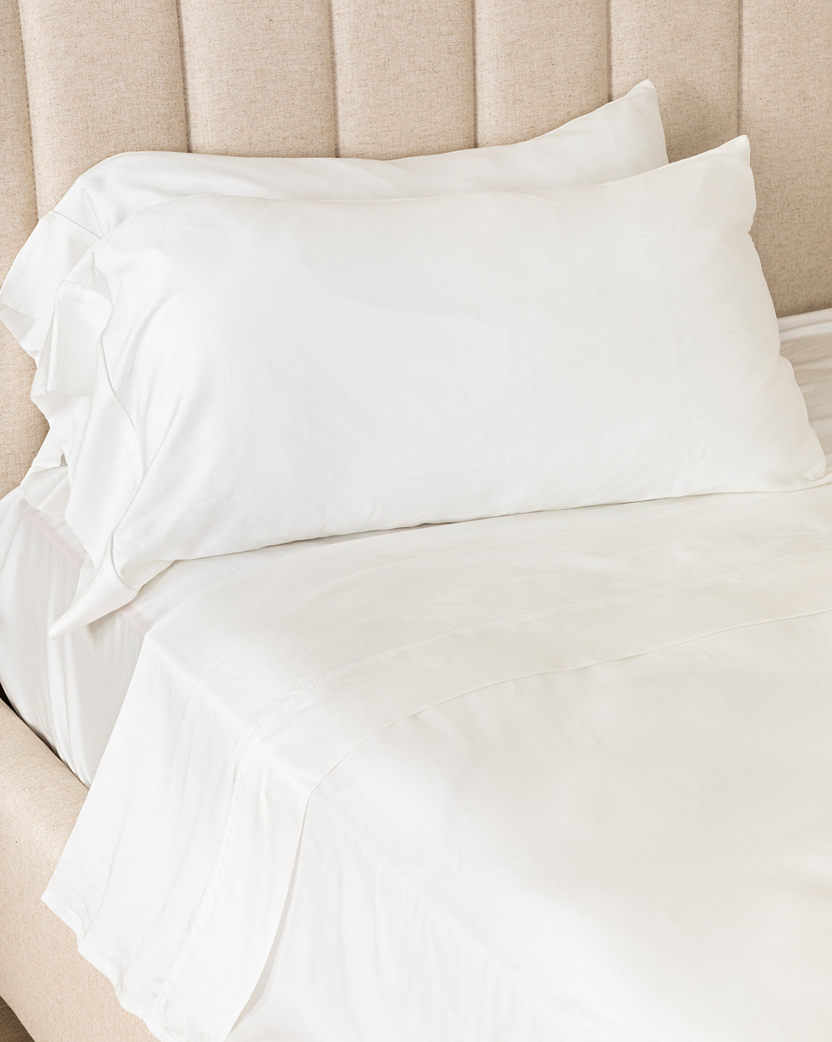 Queen Claussen Tencel sheets layered for a cozy, elegant bedroom retreat from Vendixs
