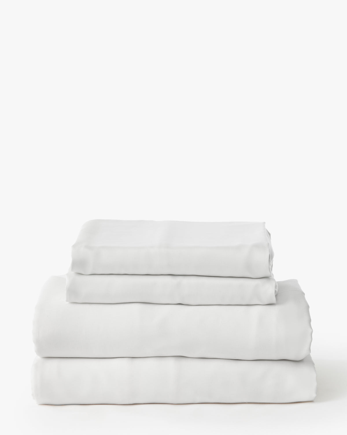 King size Claussen Tencel Sheet Set in soft sateen finish styled on a bed from Vendixs