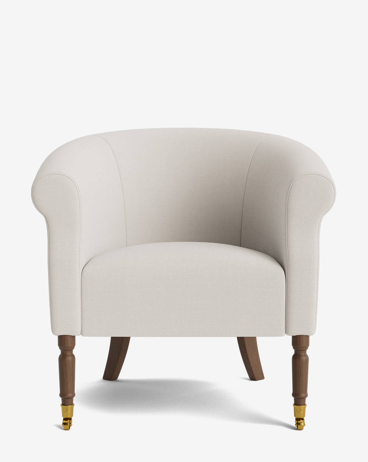 The Clemence Lounge Chair is a cream-colored classic chair with rounded arms and back, wooden legs, and brass caster wheels on front legs. It features designer fabric upholstery and is shown against a white background, by Vendixs