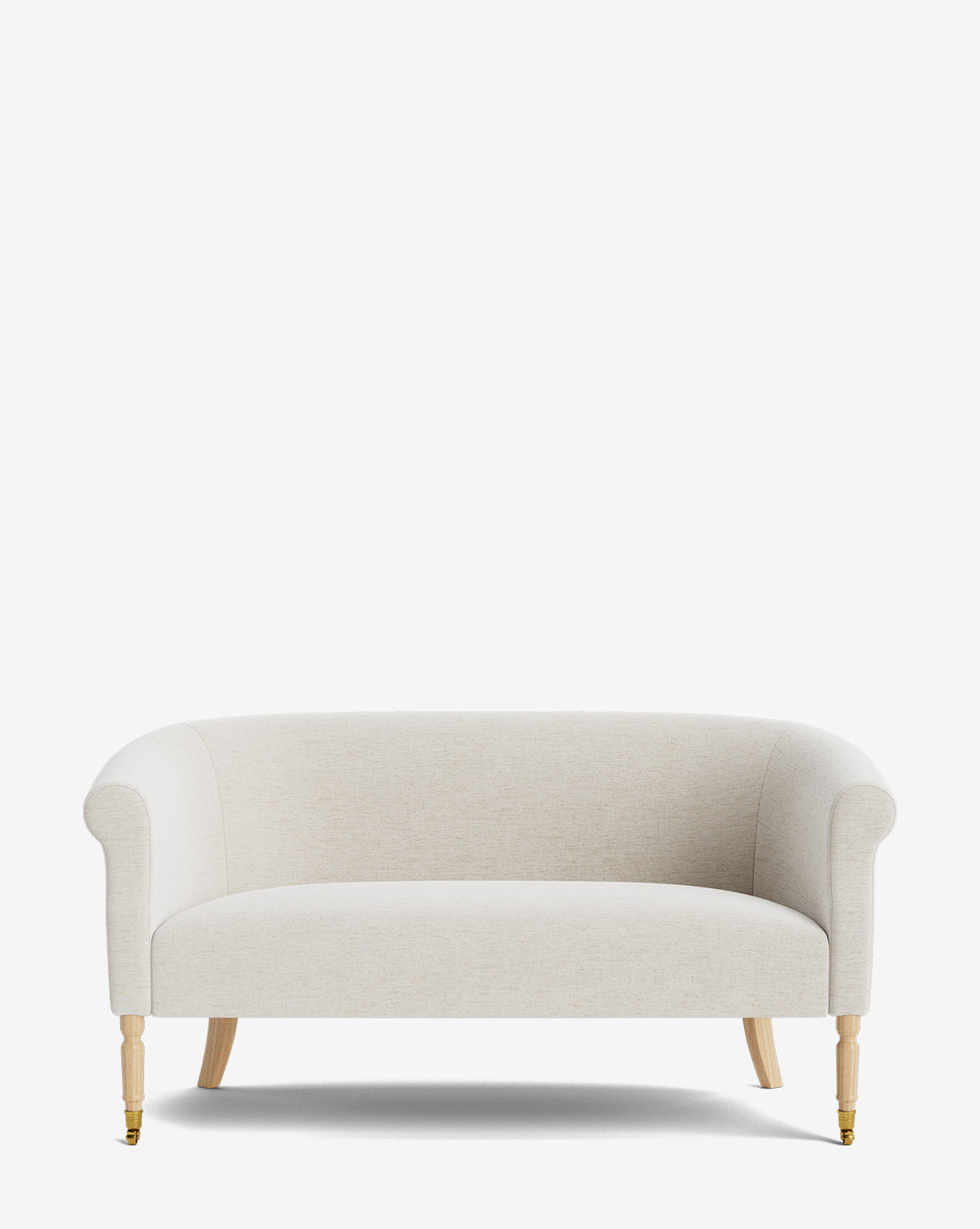The Clemence Settee 60 by Makerspalm features a beige designer fabric upholstery, curved arms, rounded backrest, and light wood legs with front brass-capped castors—an elegant addition to any living space by Vendixs
