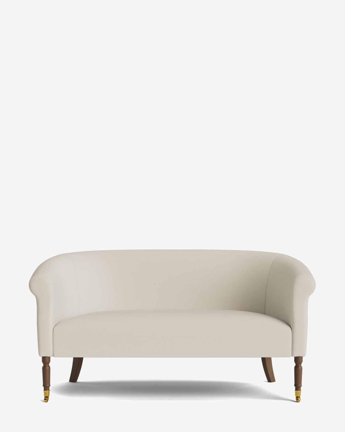 The Makerspalm Clemence Settee 60 features cream designer fabric, curved arms, dark wood legs, and brass front casters—an elegant addition to any living space against a white background. Vendixs