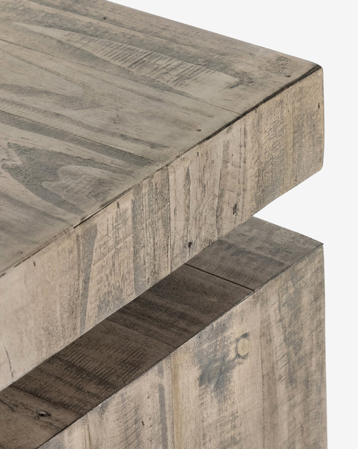 Close-up of the Colter Console Table corner, showcasing the grain, texture, and natural variations in its light, weathered reclaimed wood—ideal for a modern entryway, by Vendixs