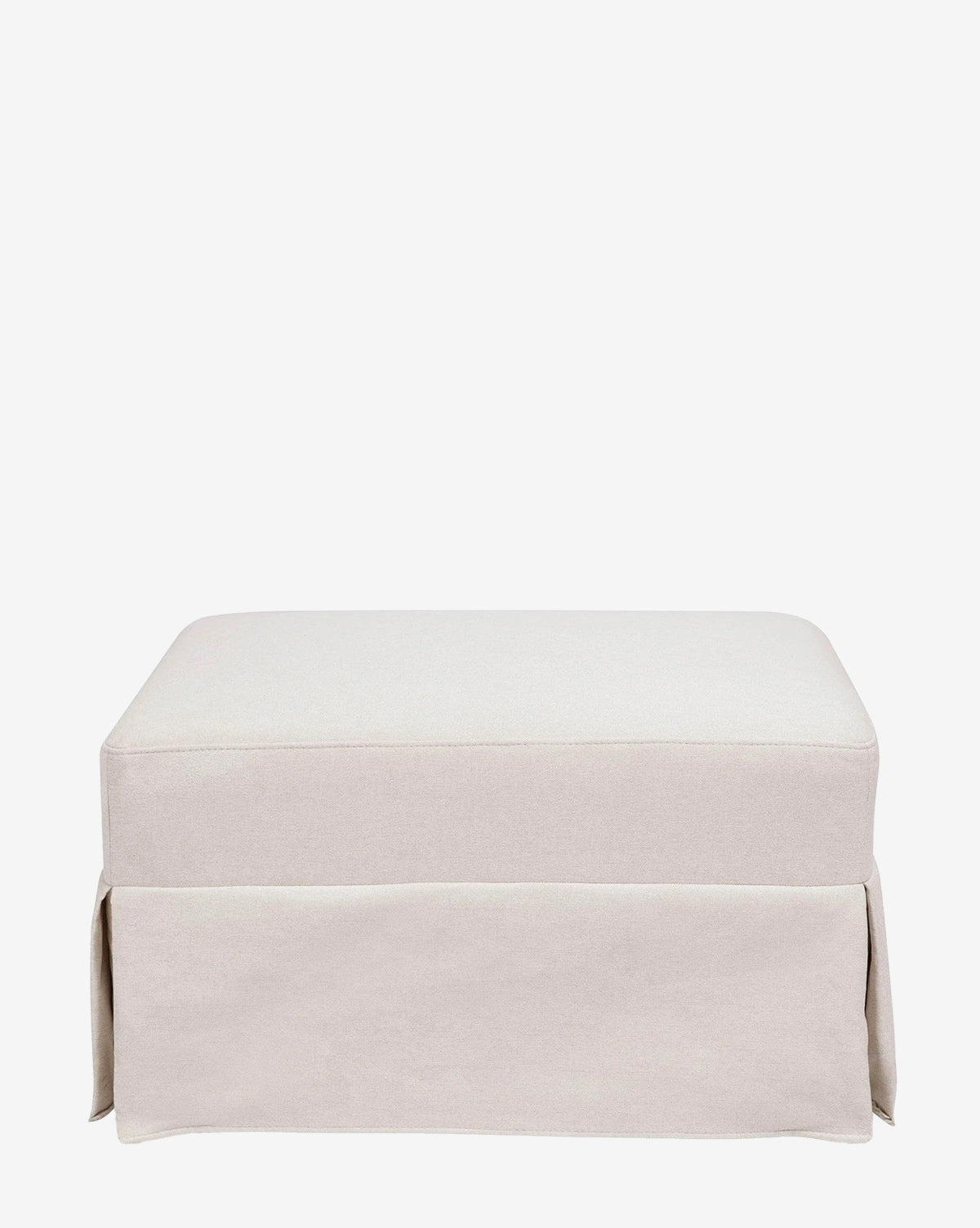 The Crawford Gliding Ottoman by Million Dollar Baby features a rectangular, light beige silhouette with a tailored skirt and minimalist eco-performance upholstery—ideal as a versatile nursery ottoman by Vendixs