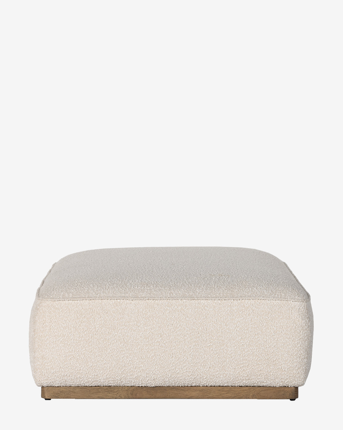 The Dawson Rectangular Ottoman by Four Hands features cream textured performance fabric and a sturdy parawood base, shown here against a plain white background, Vendixs