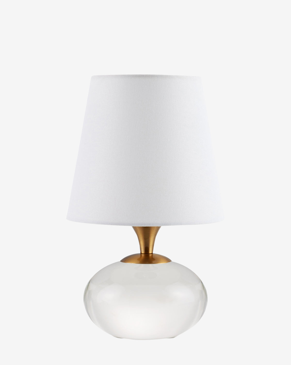 The Currey & Co. Diantha Table Lamp showcases a round clear glass base, gold neck, and white tapered fabric shade, creating a stylish accent against any plain white background. Vendixs