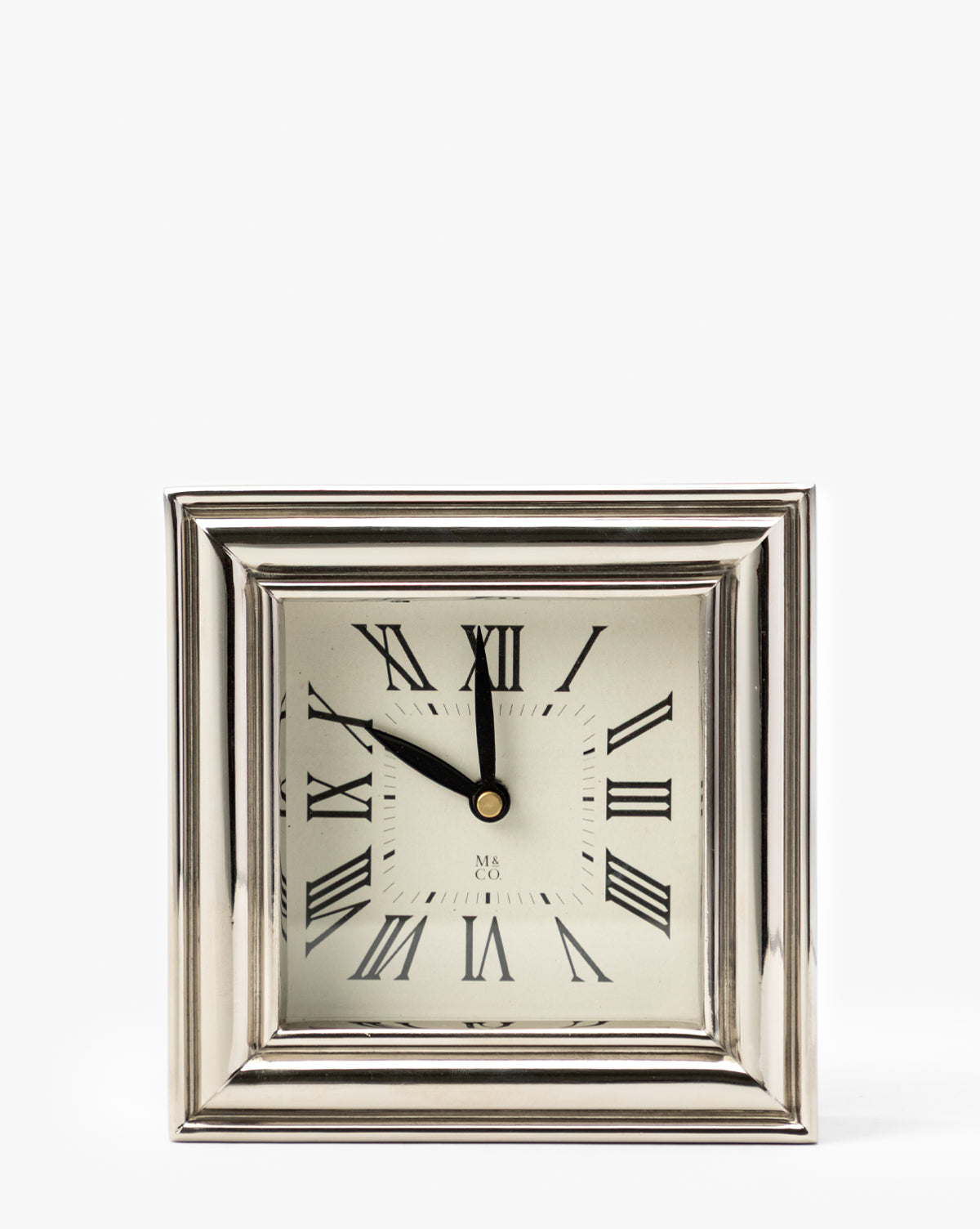 The Draper Clock, featuring a polished nickel finish, silver frame, and Roman numerals, shows the time 10:56 against a white background, by Vendixs