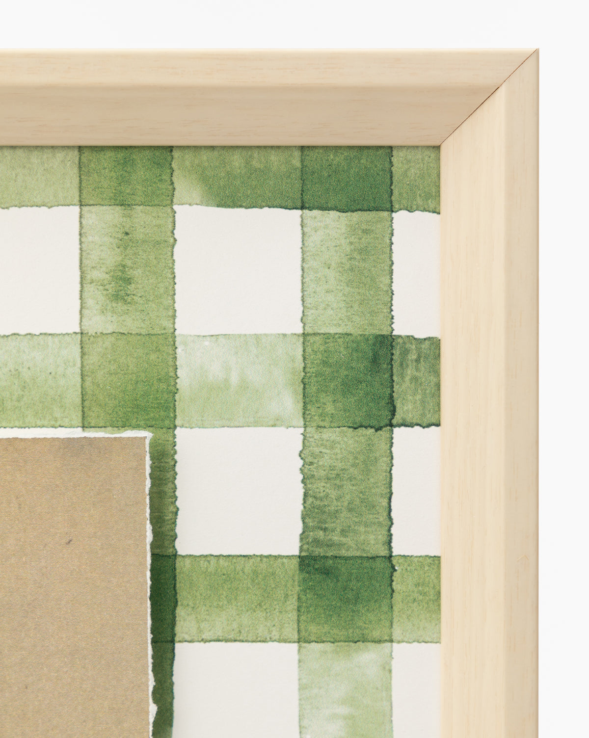 A close-up of the Dreamscape wooden frame corner, showcasing artwork with a green and white checkered watercolor pattern on premium paper and a torn brown overlay—ideal for distinctive home decor, by Vendixs