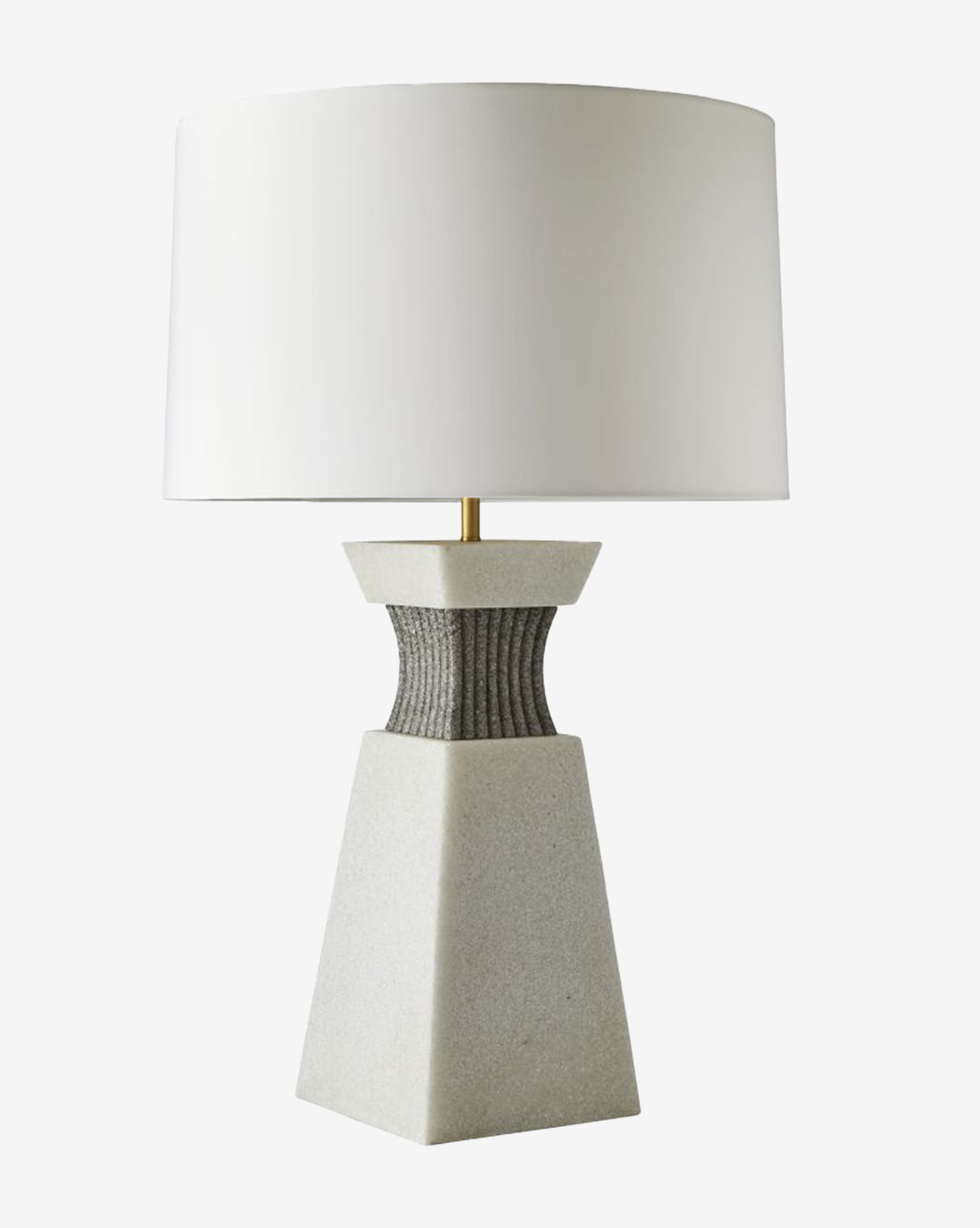 The Dynasty Table Lamp boasts a modern stone base with a textured dark gray top section and is finished with a wide, tapered off-white shade for a sleek, contemporary style, by Vendixs