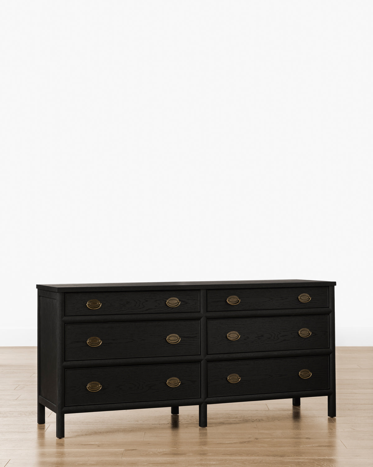 The Edward Dresser features six spacious drawers with round brass handles, offering elegant bedroom storage, by Vendixs