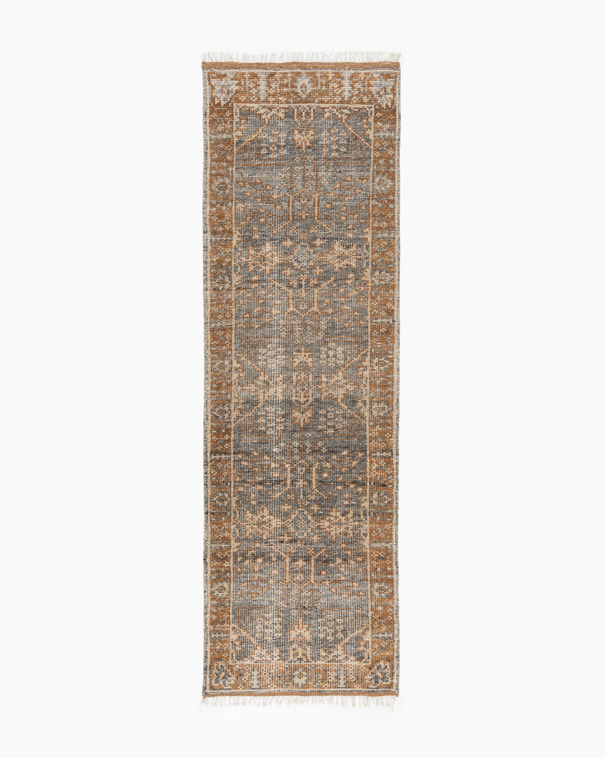 The Elison Hand-Knotted Wool Rug is a rectangular runner with a distressed vintage pattern in muted blue and brown, highlighted by a central geometric design, artisan-inspired details, and fringed edges for unique character, by Vendixs