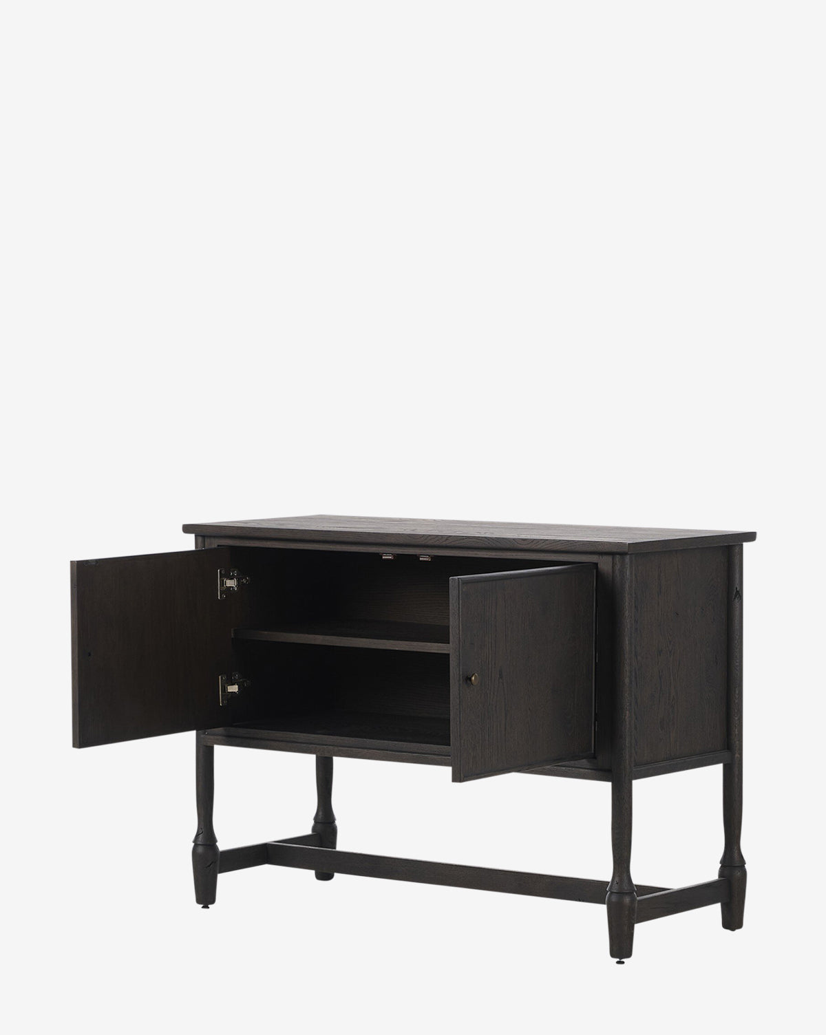 The Elmer Sideboard is crafted from solid oak with a cracked smoked black veneer. It features two cabinet doors with an interior shelf and stands on four legs with a crossbar for sturdy support, by Vendixs