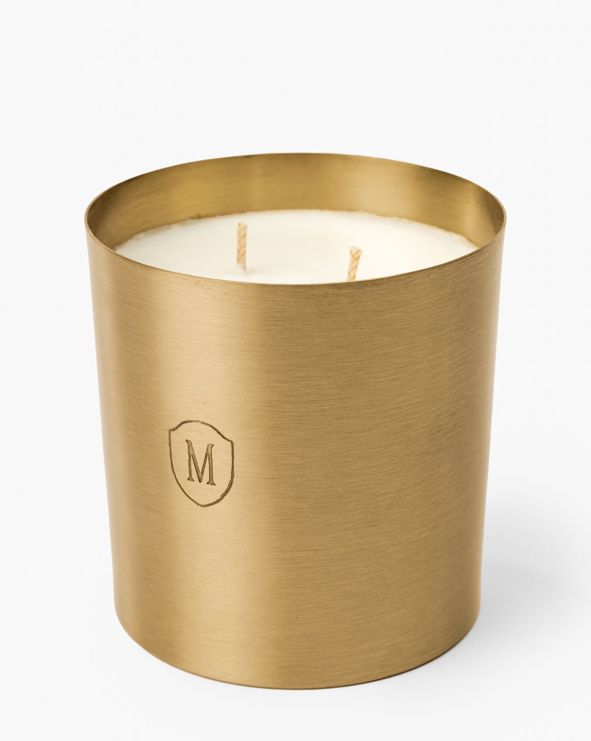 The holder is adorned with an engraved shield emblem bearing the letter M for added sophistication, by Vendixs