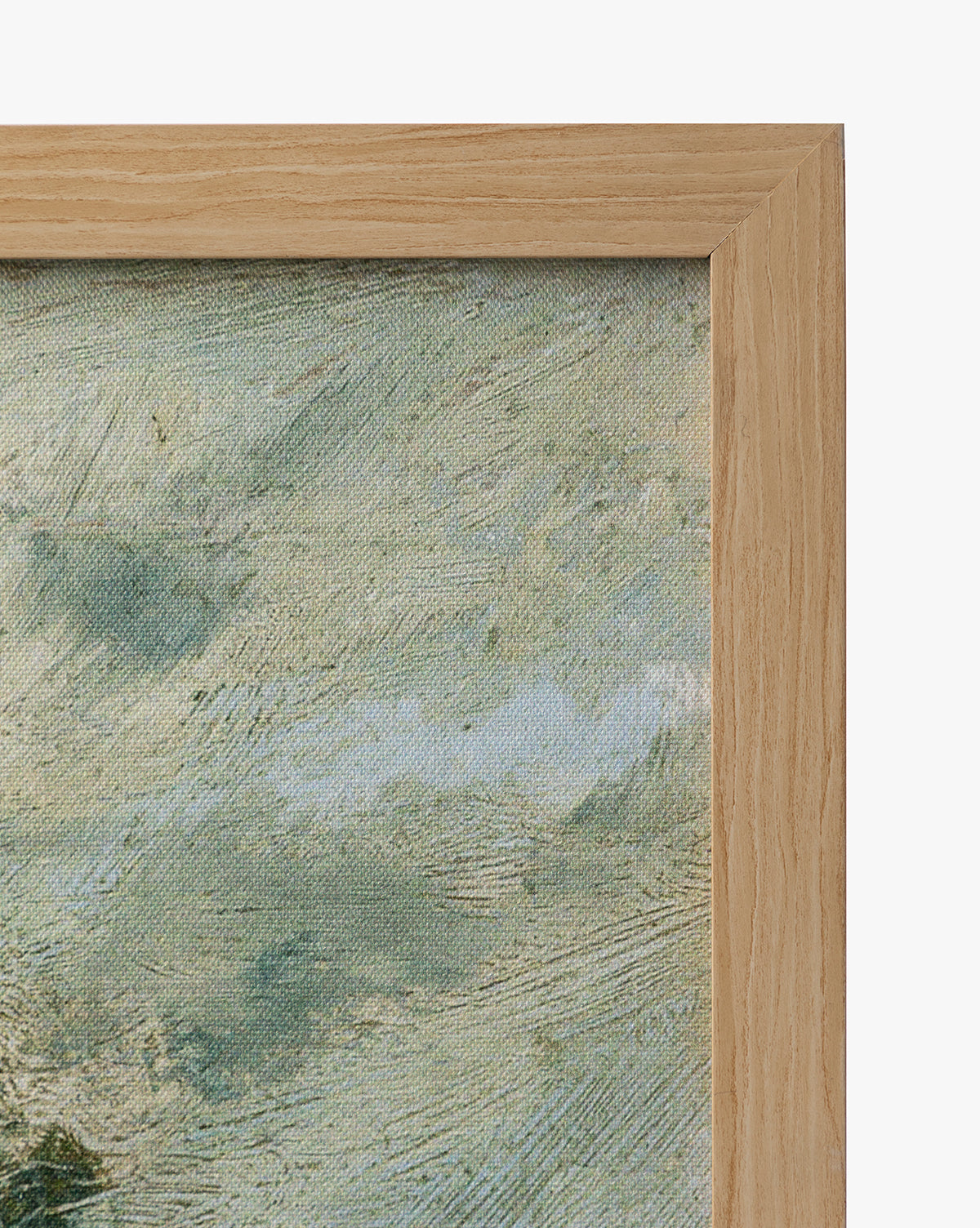 Close-up of the top right corner of a natural oak frame with textured canvas inside, featuring English Meadows—an abstract blue, white, and green countryside landscape giclee by Vendixs