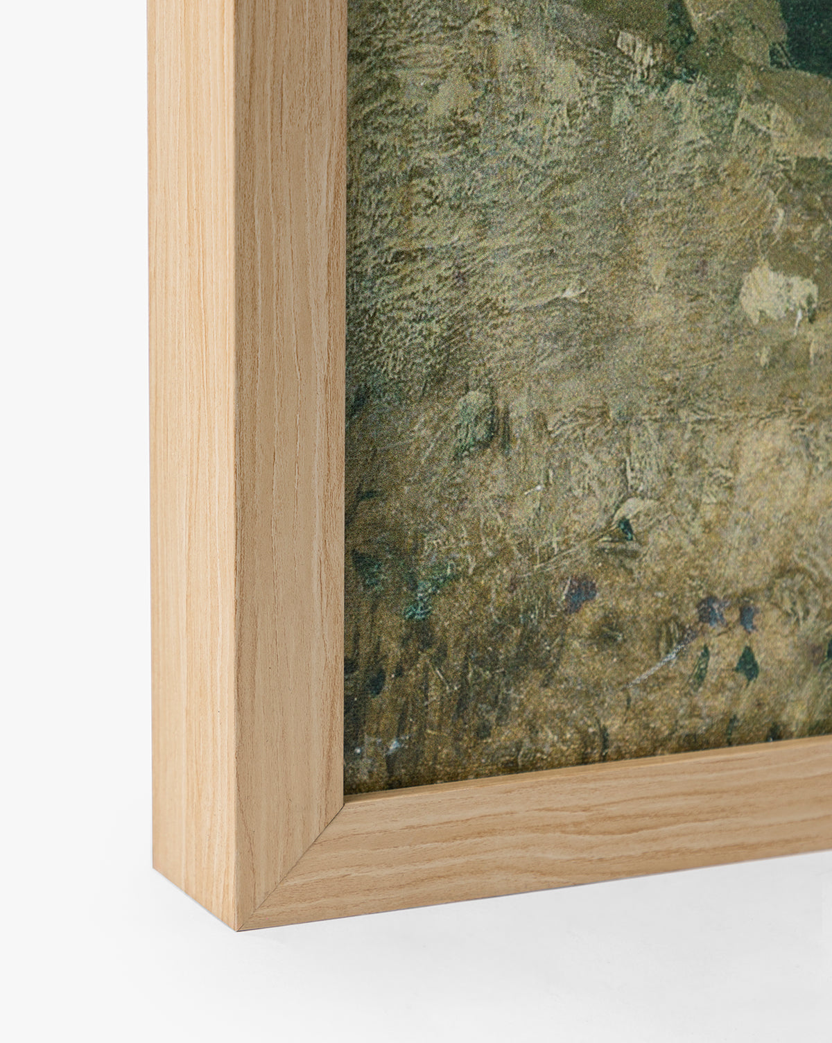 Close-up of the bottom left corner of a natural oak wood frame featuring English Meadows, a green and brown textured countryside landscape giclee on canvas, set against a plain white background, by Vendixs