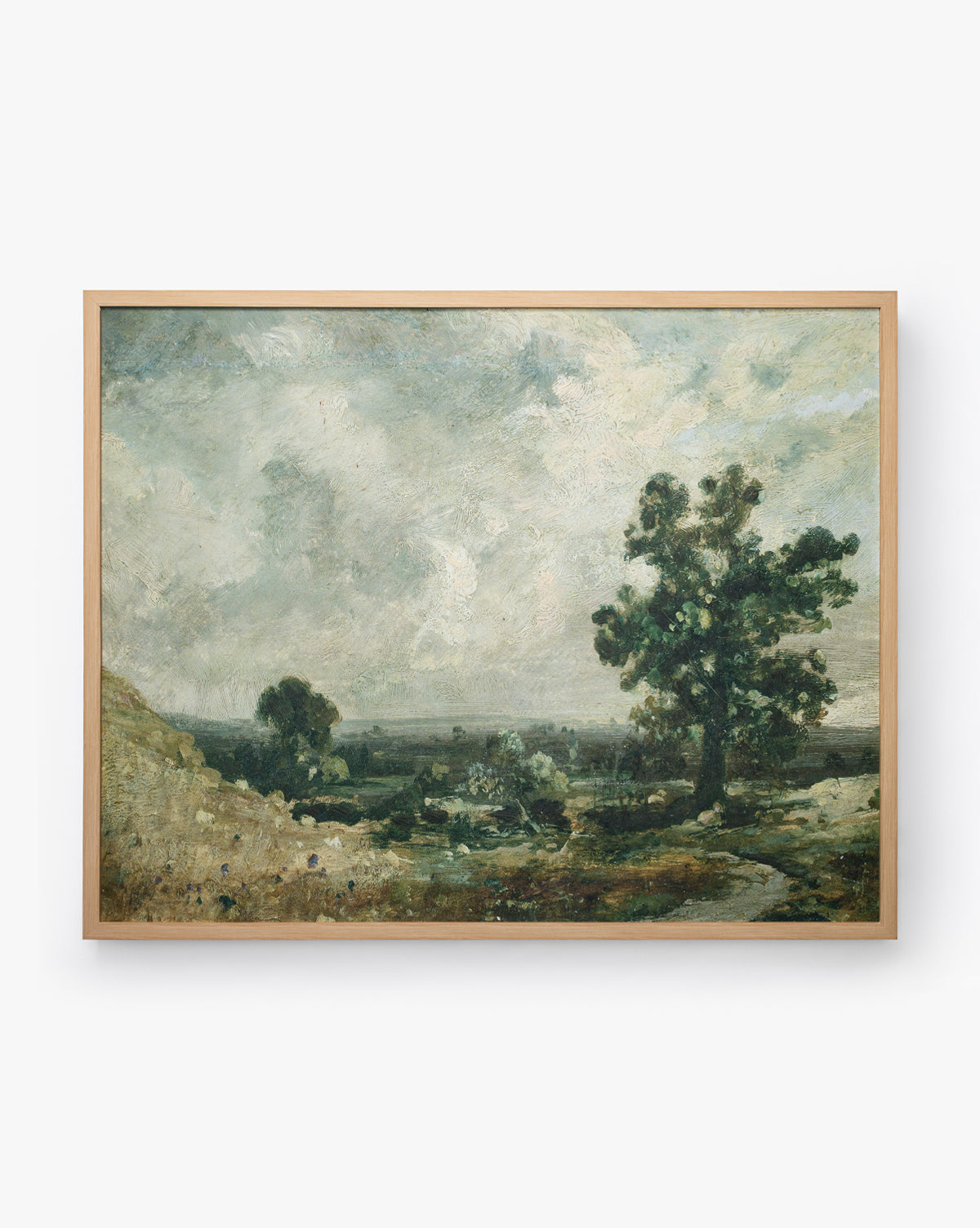 The English Meadows painting showcases a countryside landscape with a large tree, grassy fields, and a cloudy sky in muted tones, all set in a natural oak wood frame, by Vendixs