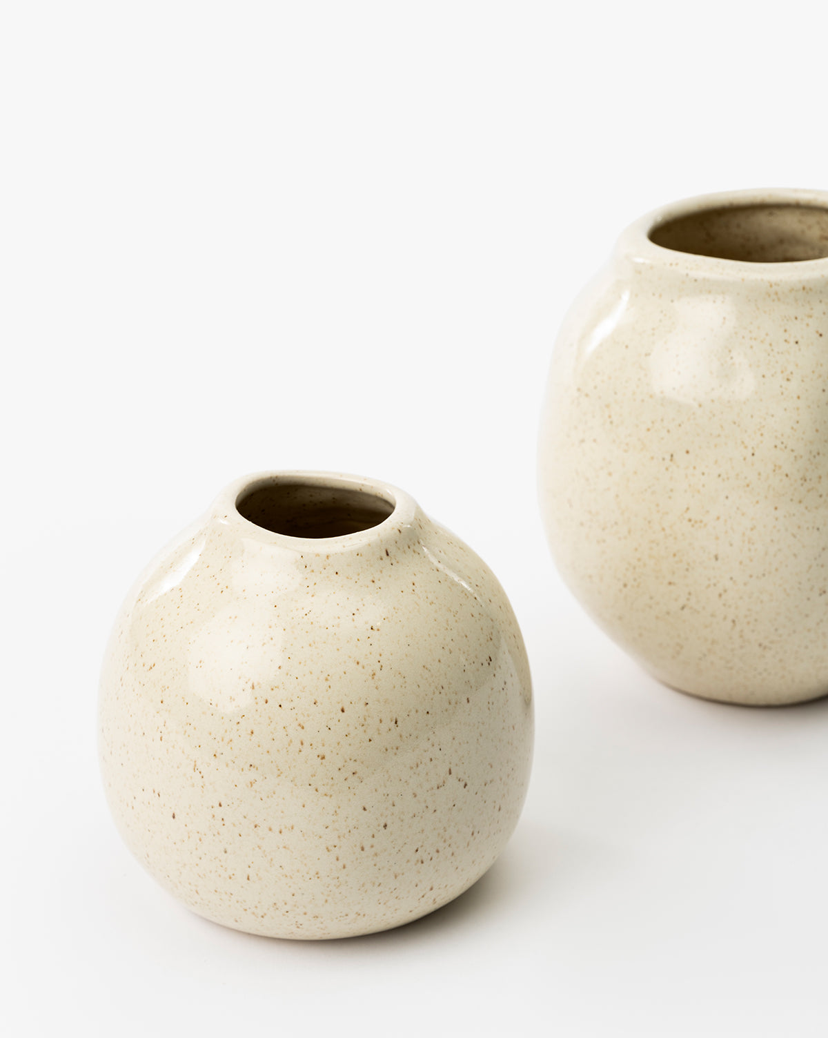 One vase is in front, with the second partially visible behind, by Vendixs
