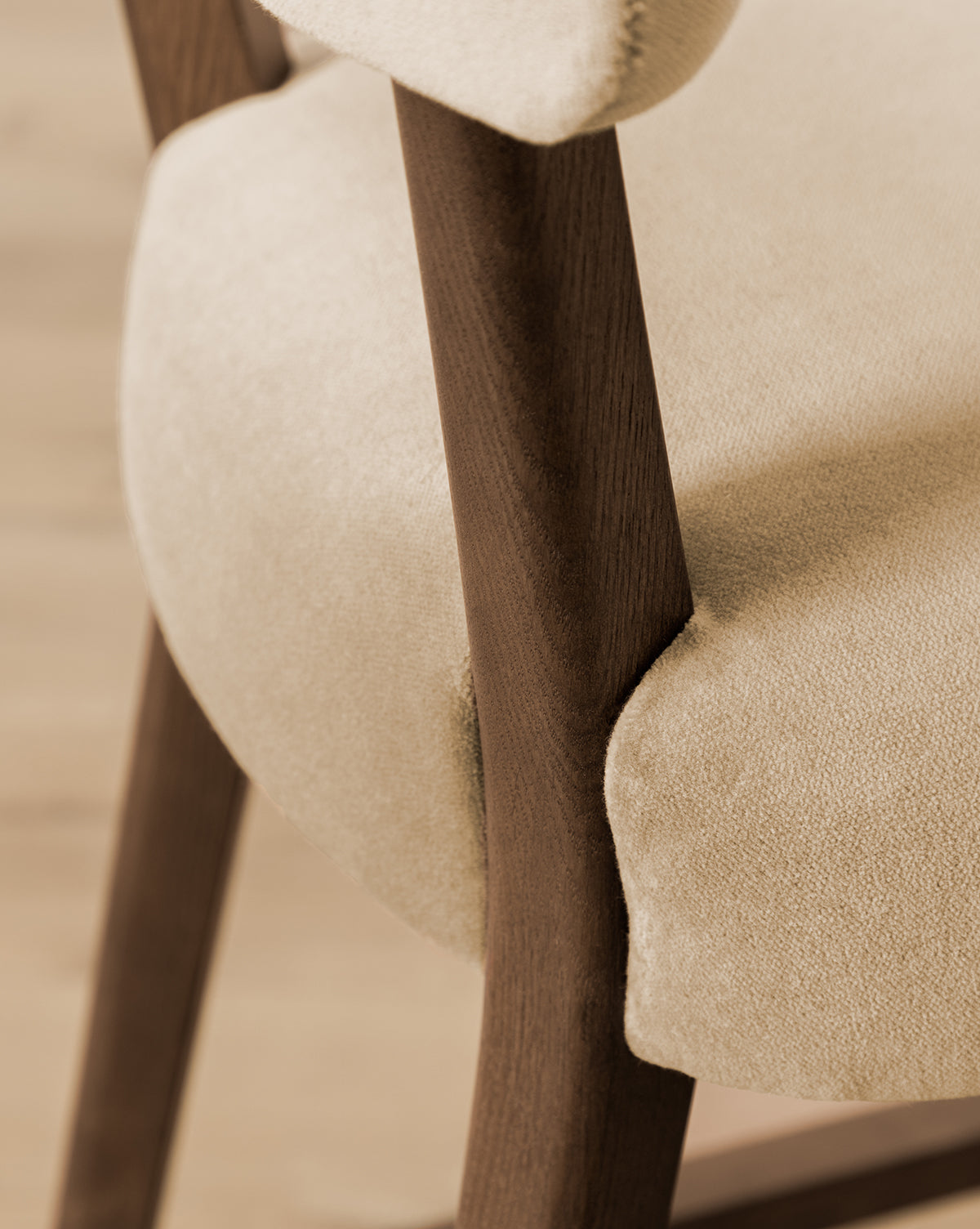Certainly! Here’s your blended sentence with the exact string Vendixs at the end: Close-up of the Etienne Stool (Ready to Ship) by Makerspalm, a vintage-inspired piece with beige upholstery and a dark wooden frame that showcases textured fabric and a smooth wood finish. Vendixs