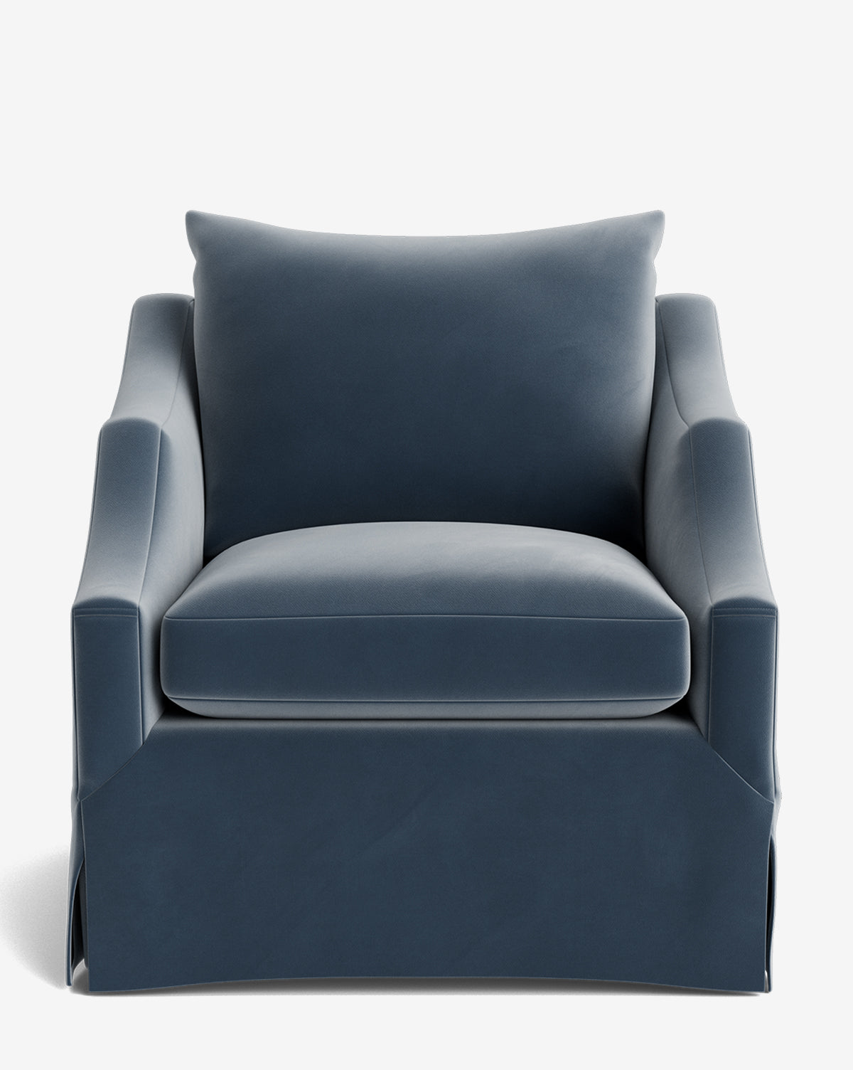 The Everleigh Slipcover Lounge Chair is a modern armchair with dark blue upholstery, wide arms, thick cushions, and a boxy shape. Featuring a solid oak frame and skirted base, it offers customizable style and comfort for any space by McGee & Co.